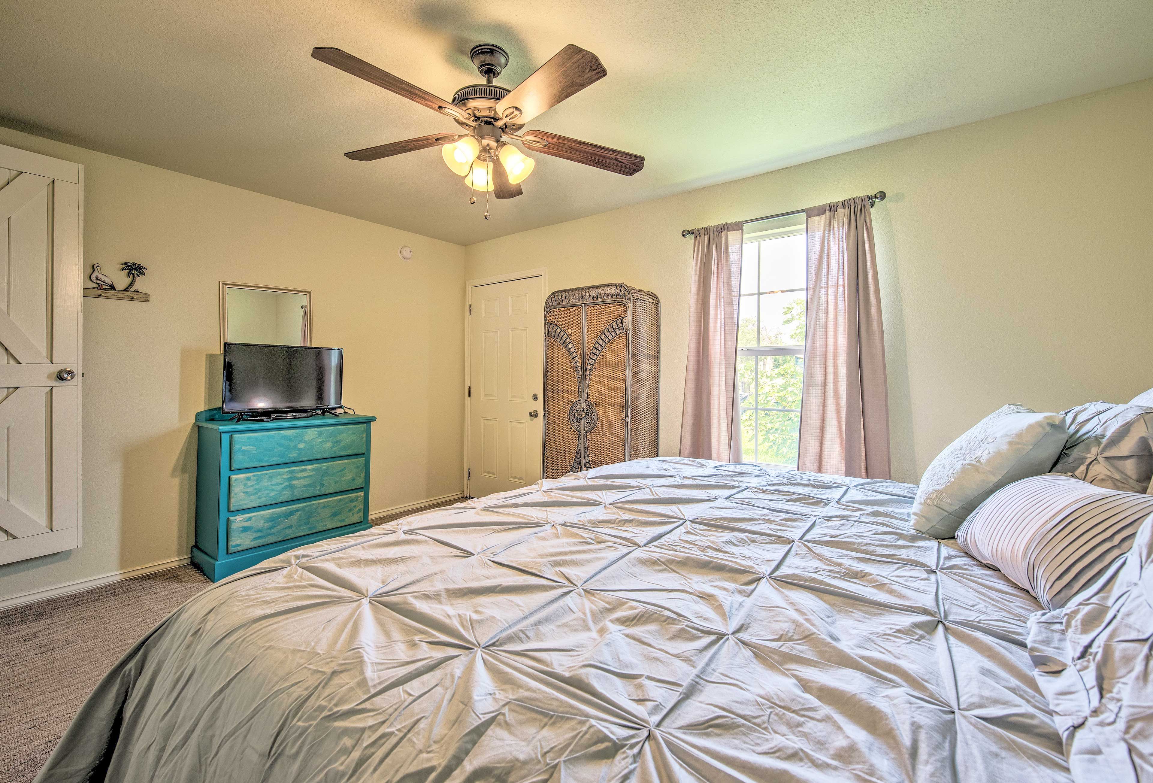 Hide away belongings in the armoir and dresser.