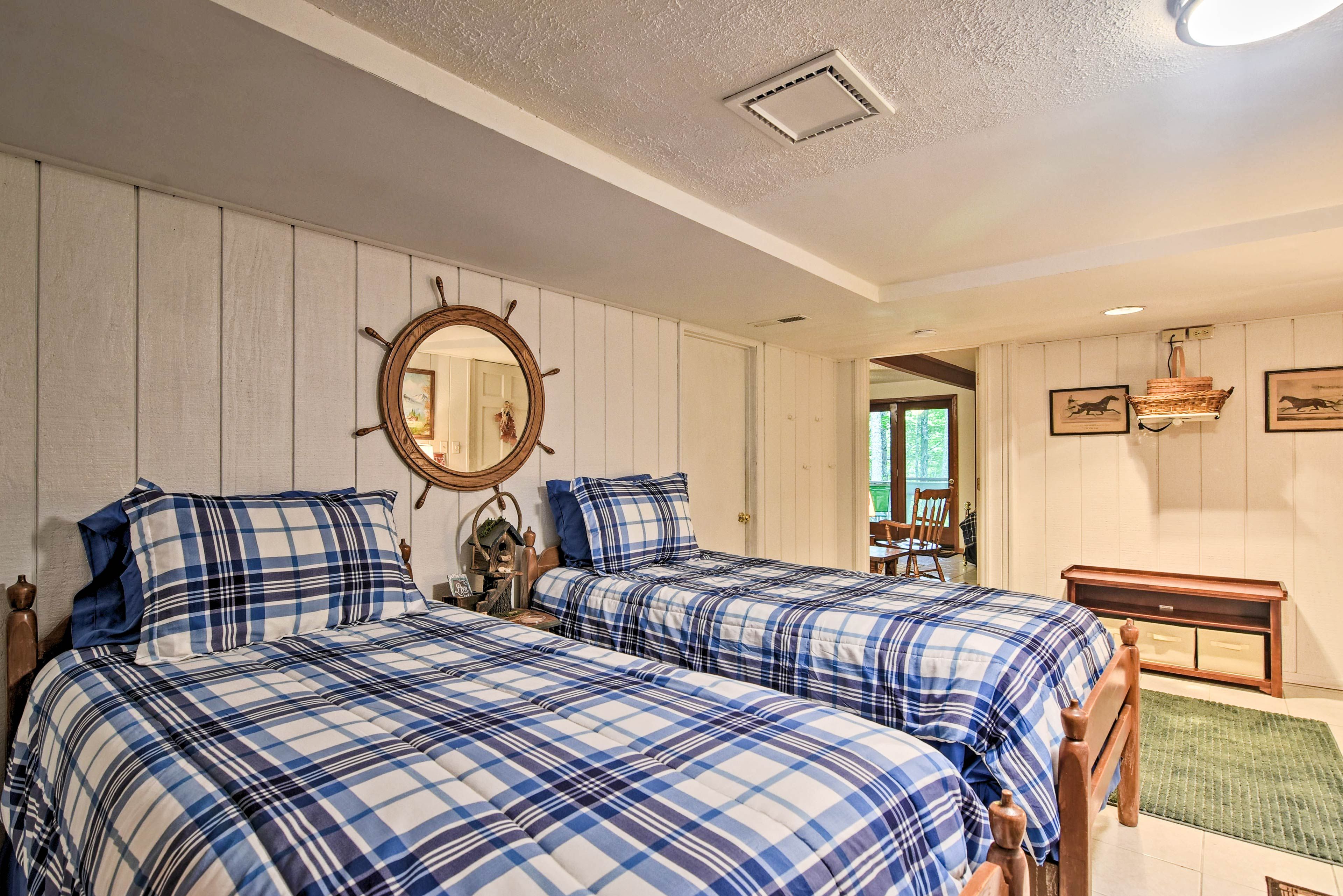 Two guests can claim the twin beds in this room.