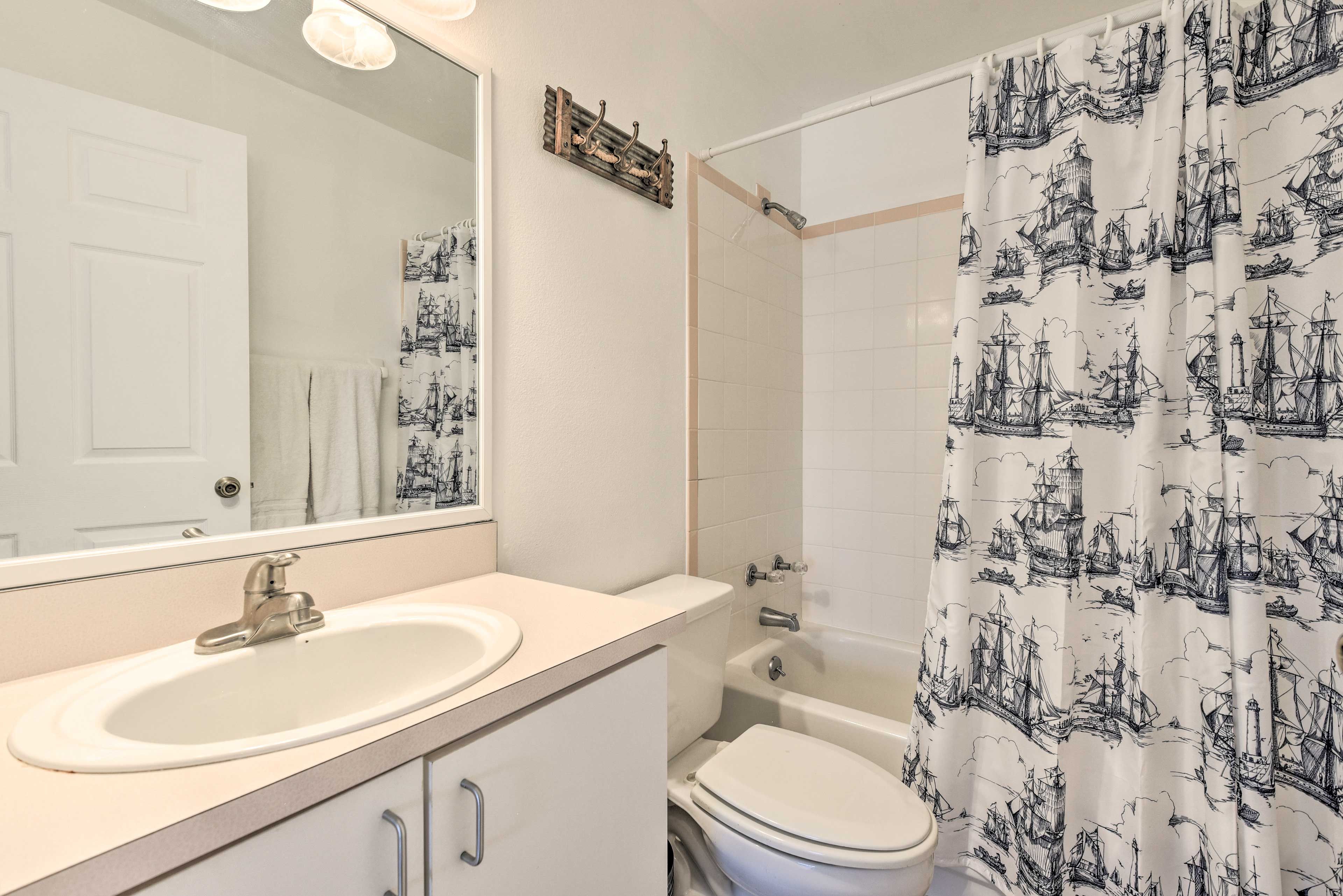 This nautical bathroom includes complimentary toiletries.