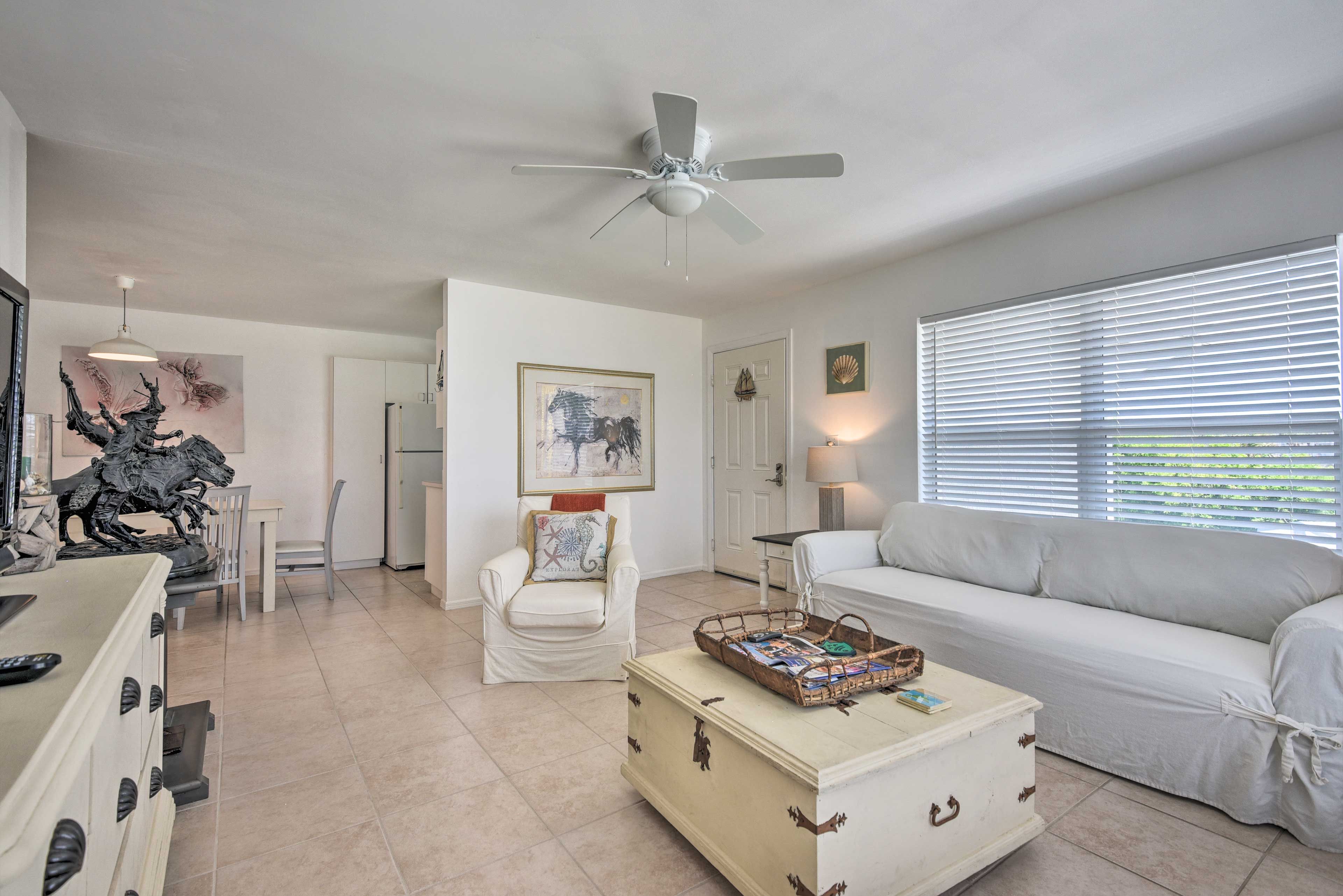 This living room boasts a sleeper sofa.