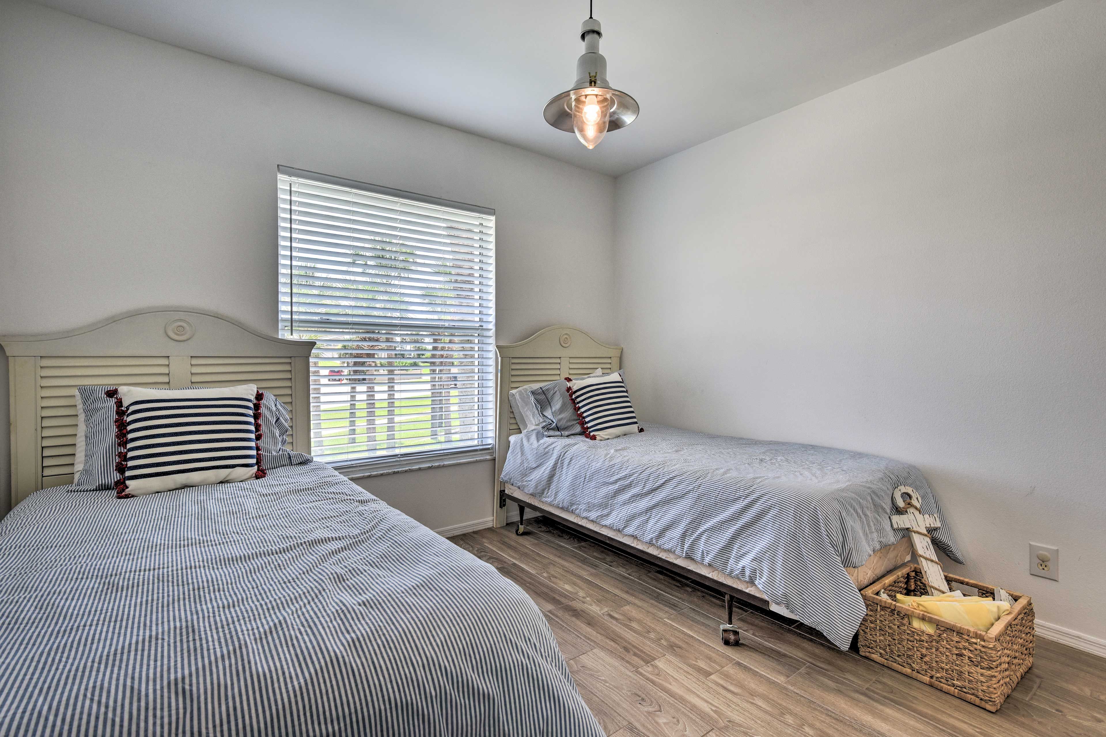 Dream of sailboats as you drift off to sleep in this beachy room!
