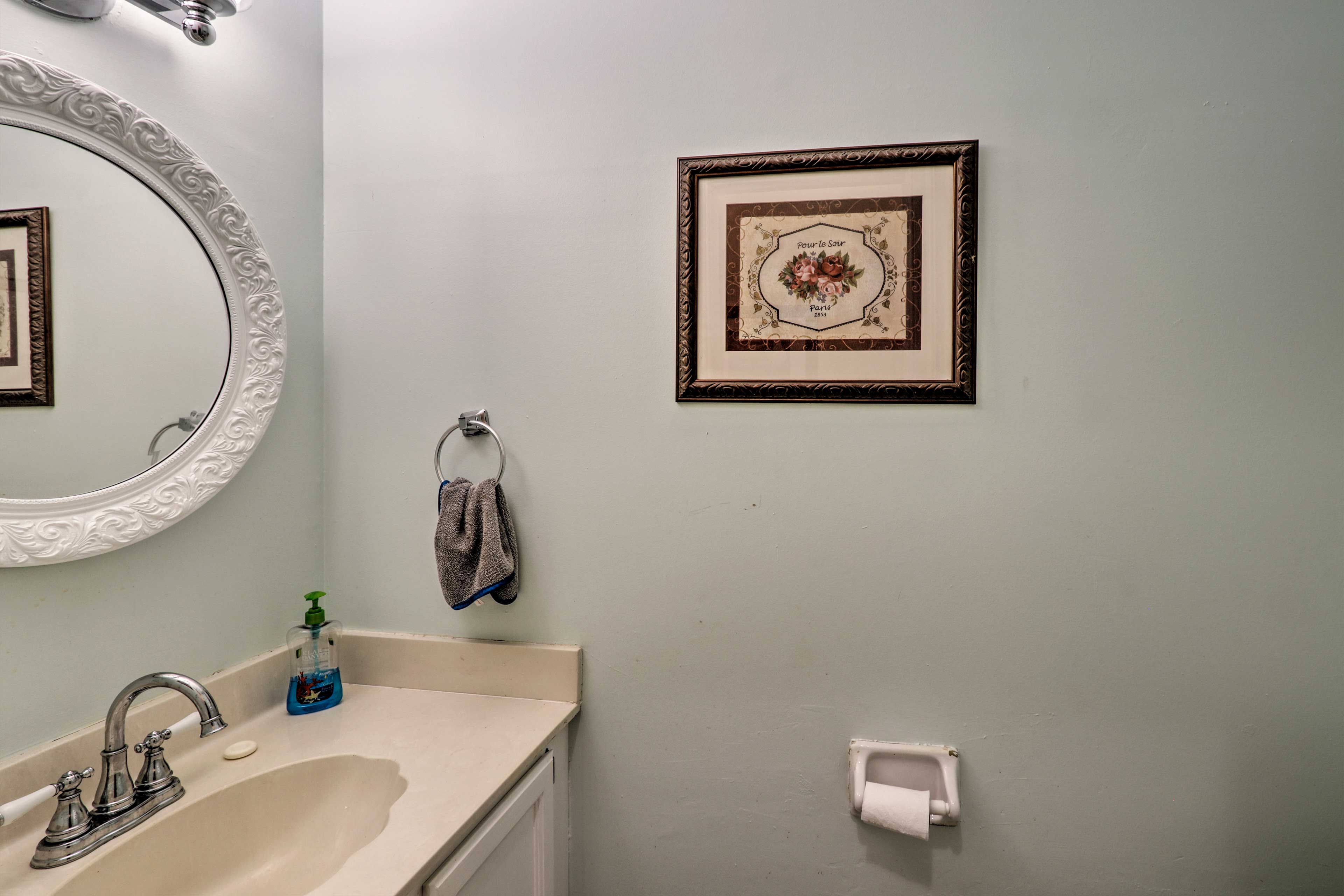 Wash your hands in the half bathroom.