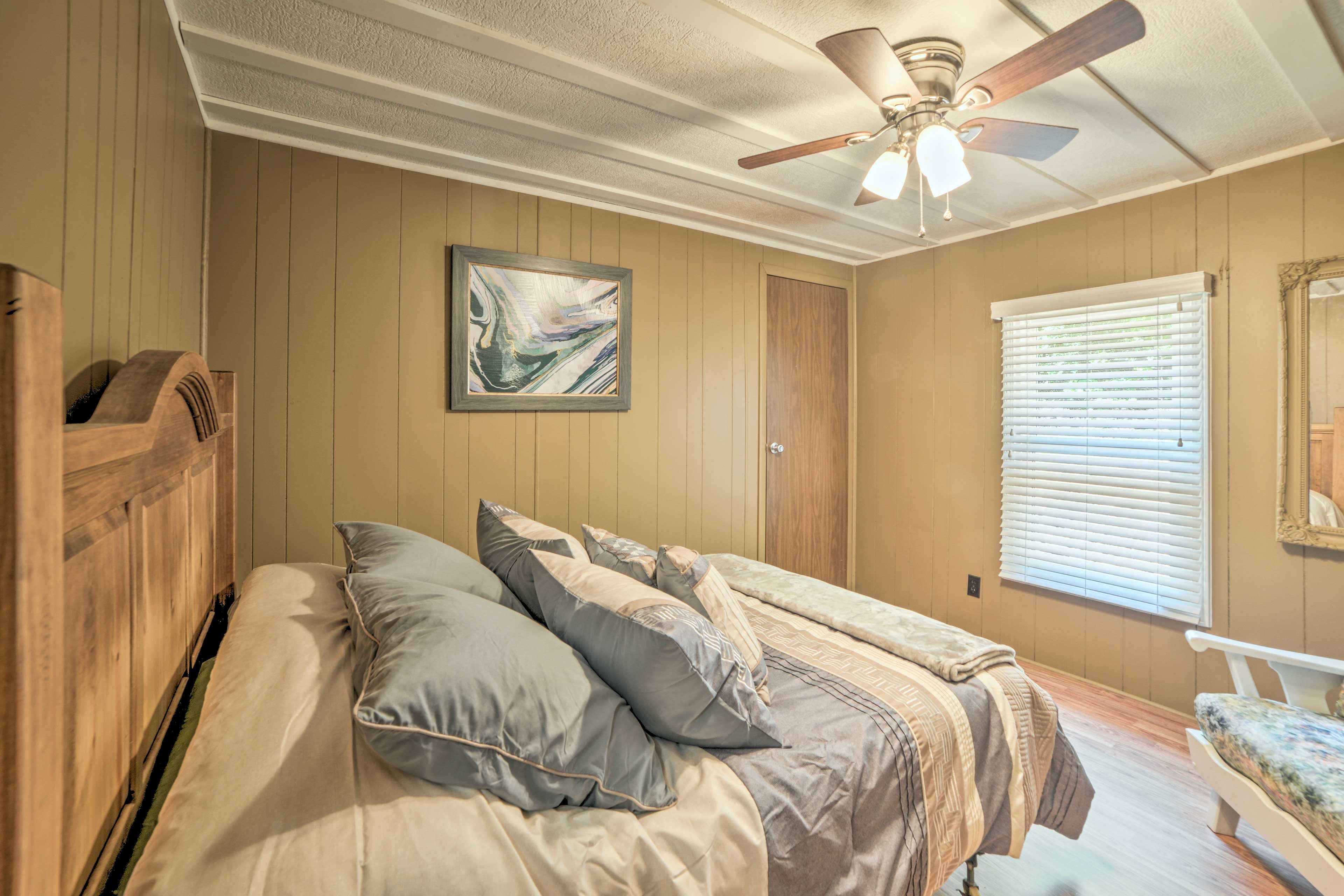 Drift to sleep in this queen bed.