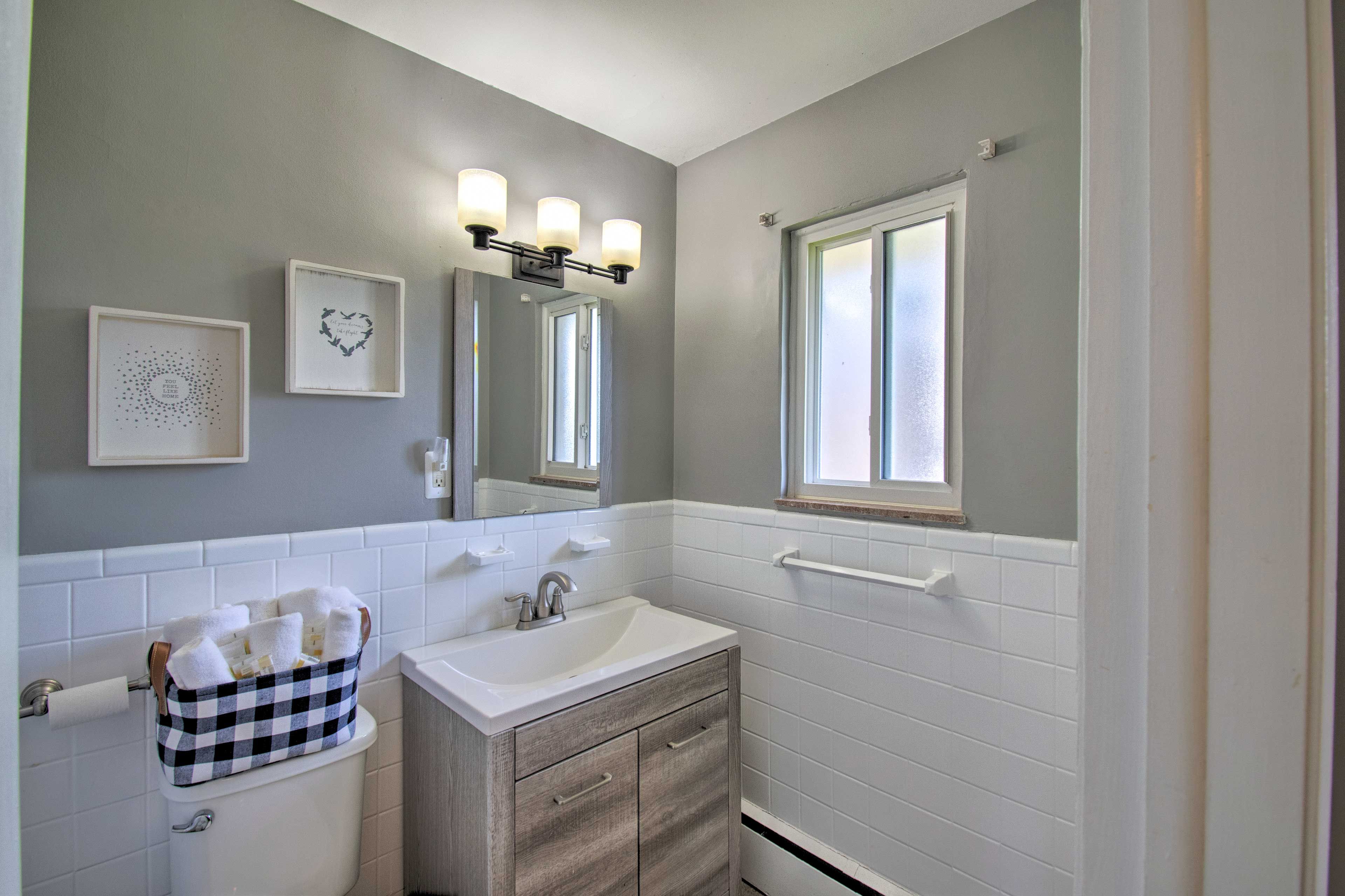 Get ready in the full bathroom using provided towels.