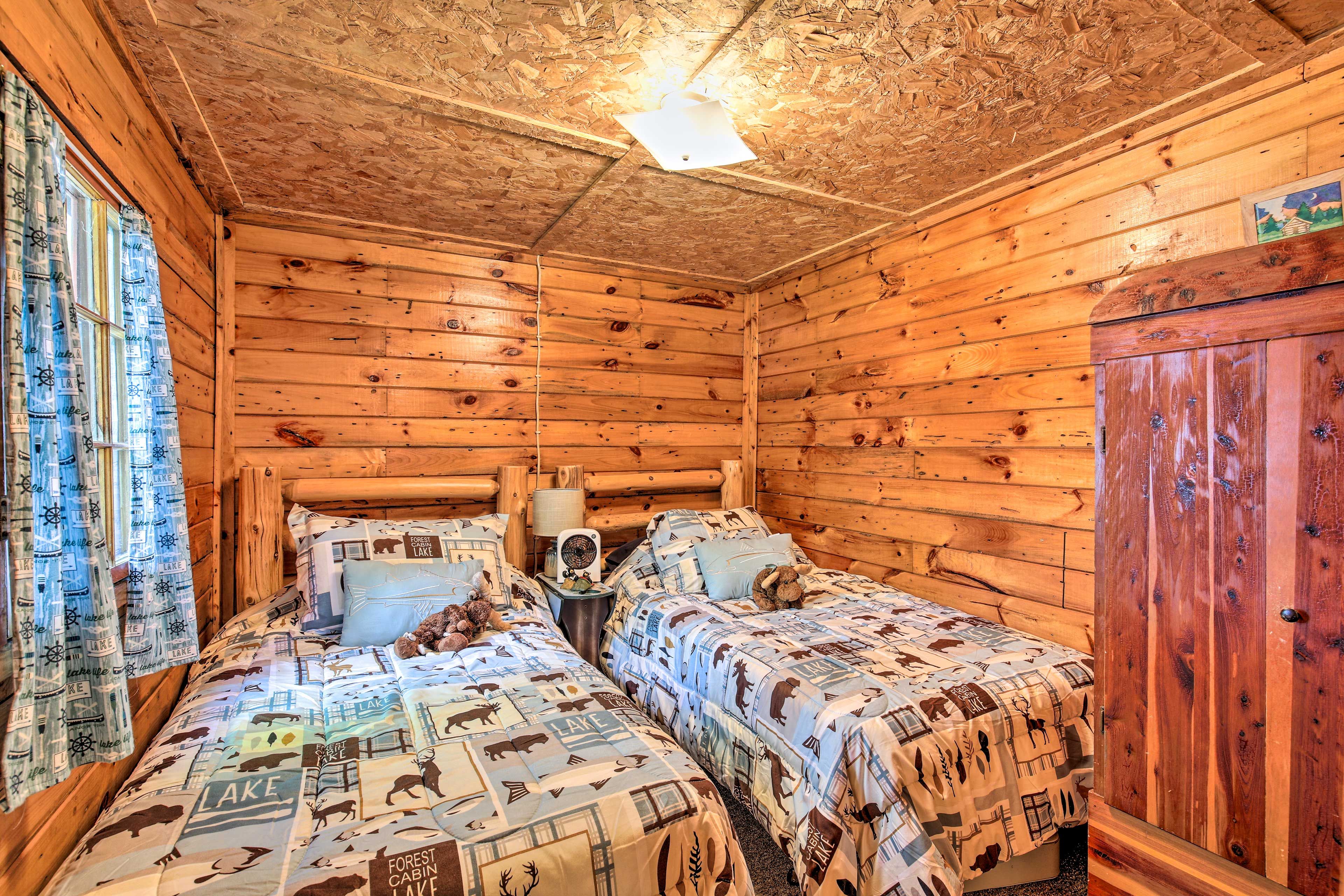 Sleep two in the wooden twin beds.