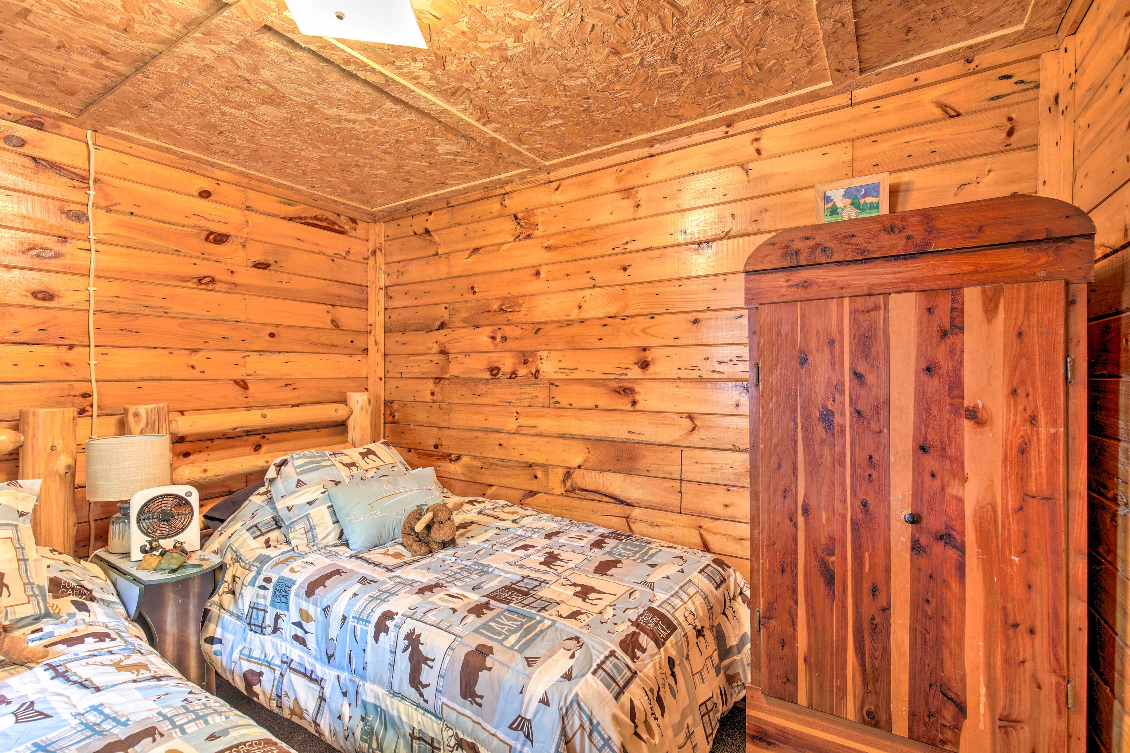 Tuck away your clothes in the spacious wardrobe.