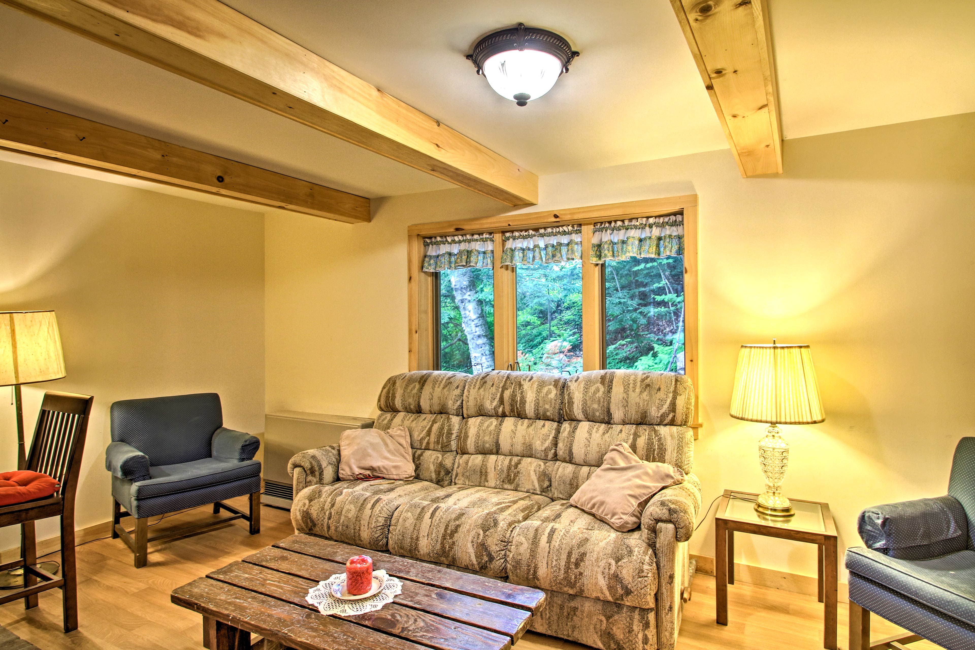 This nearby comfy couch is the perfect place to take it easy.