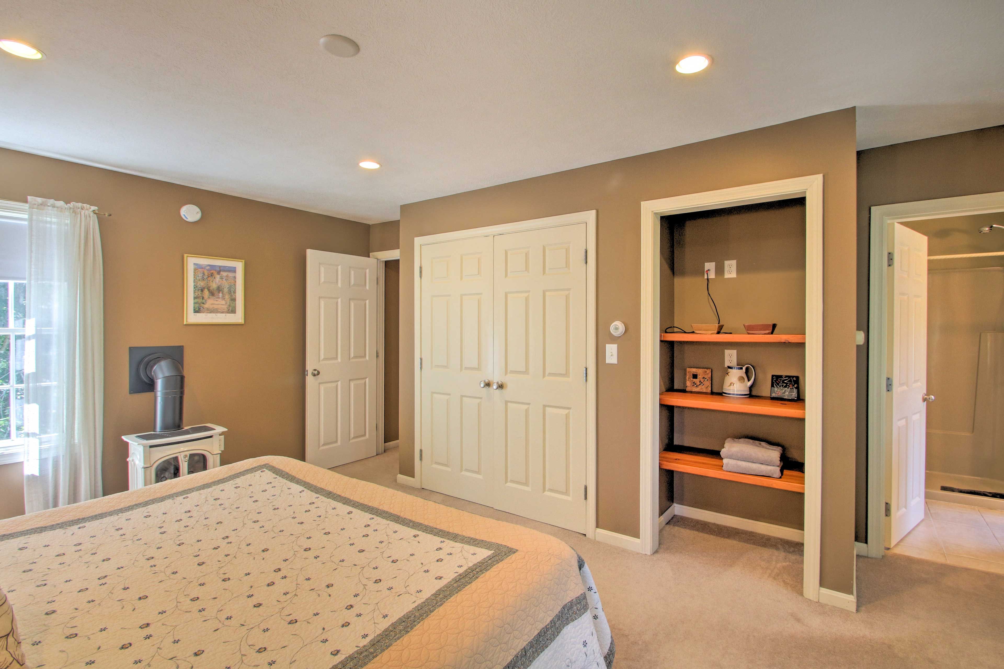 Stow your luggage in the double-door closet.