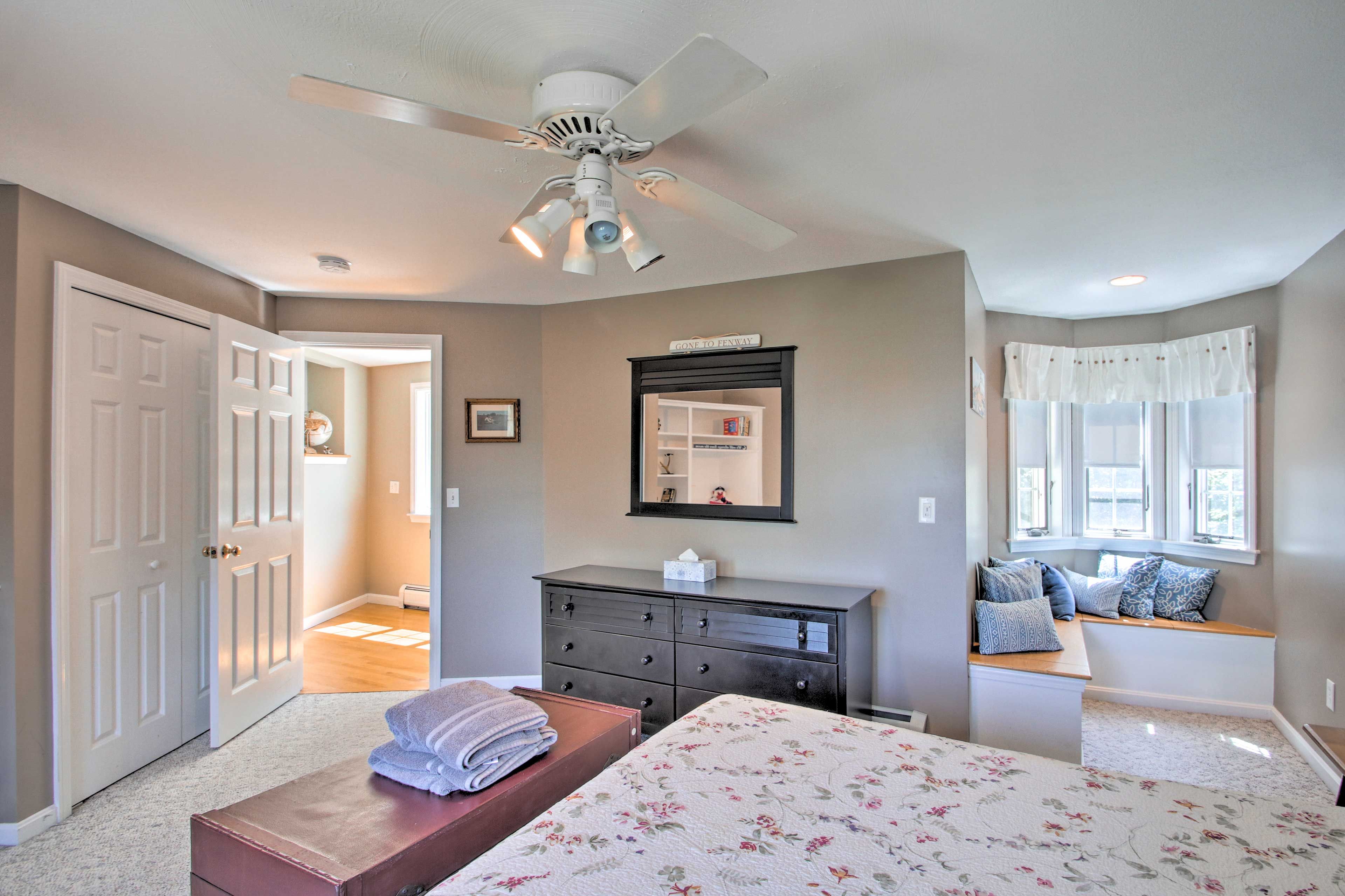 Hide away in the sunny nook of this large bedroom.