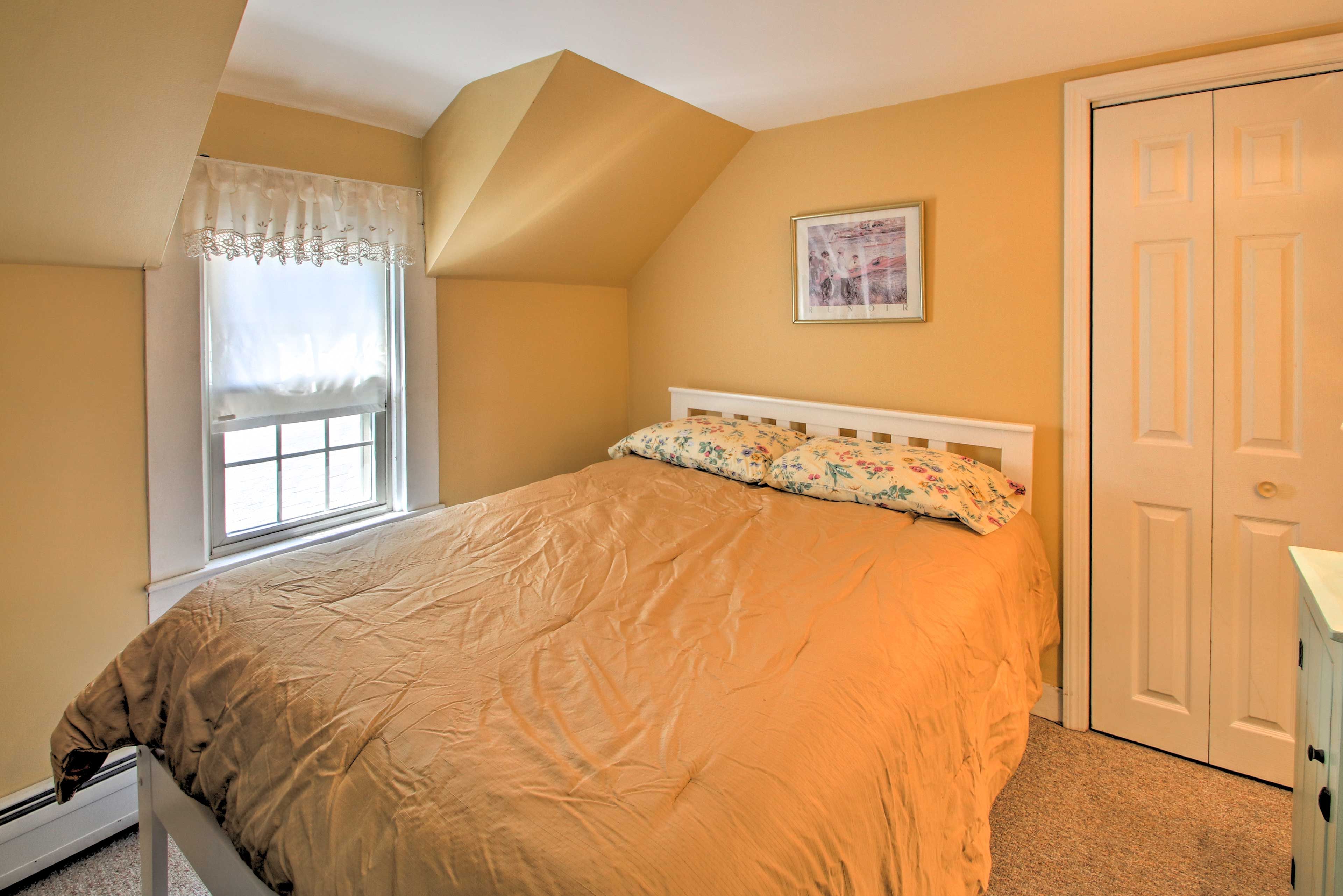 Brighten your day in bedroom 5 with a full-sized bed.