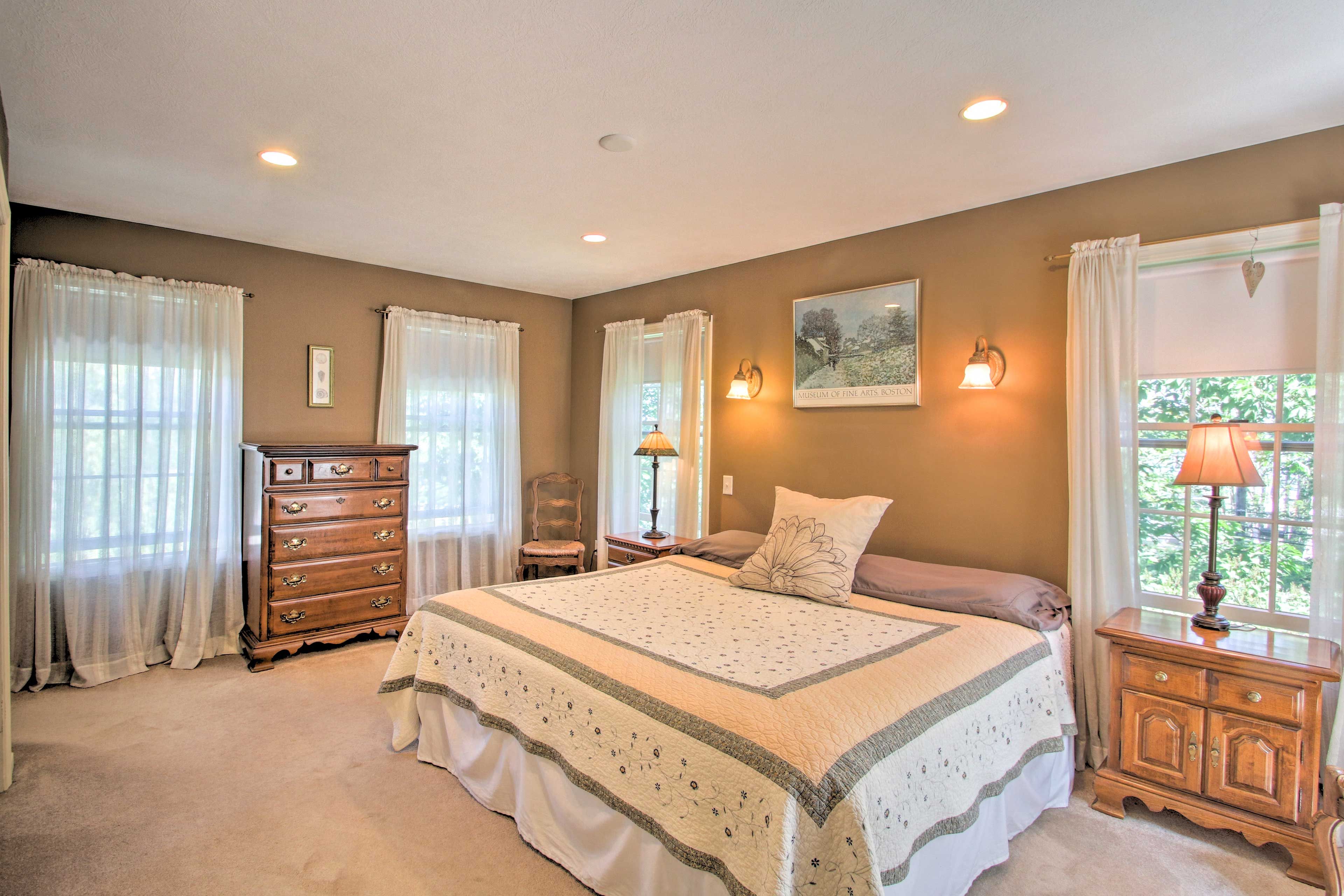 Spread out in the second main bedroom's king-sized bed!