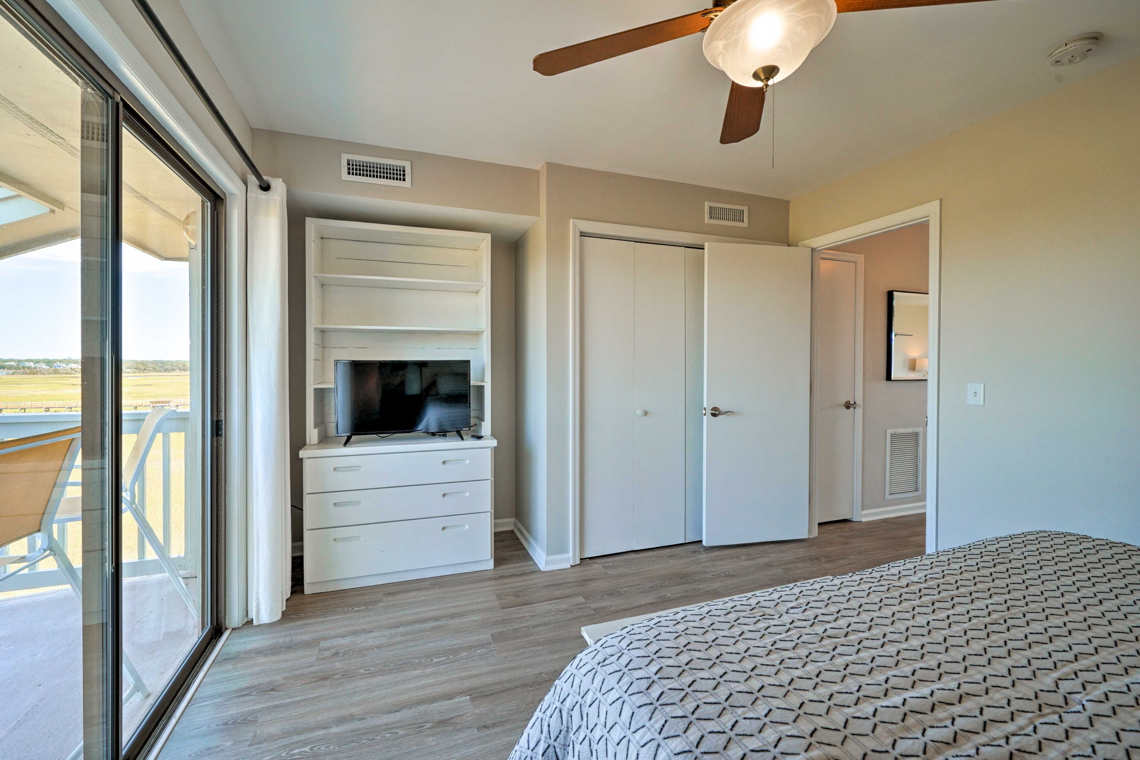 Hide away belongings in the closet and dresser.