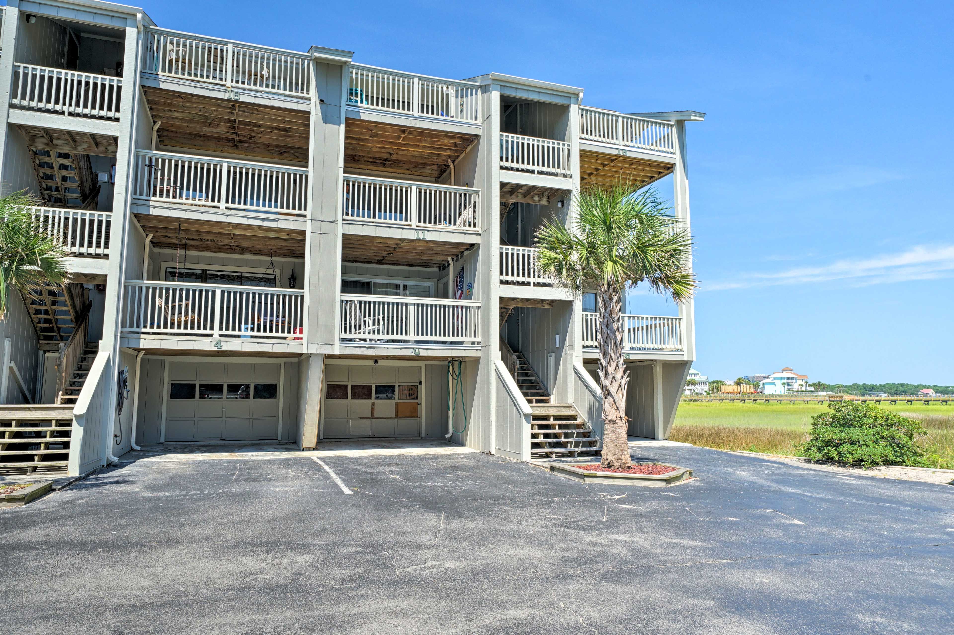 Easily park 2 vehicle in front of the condo.