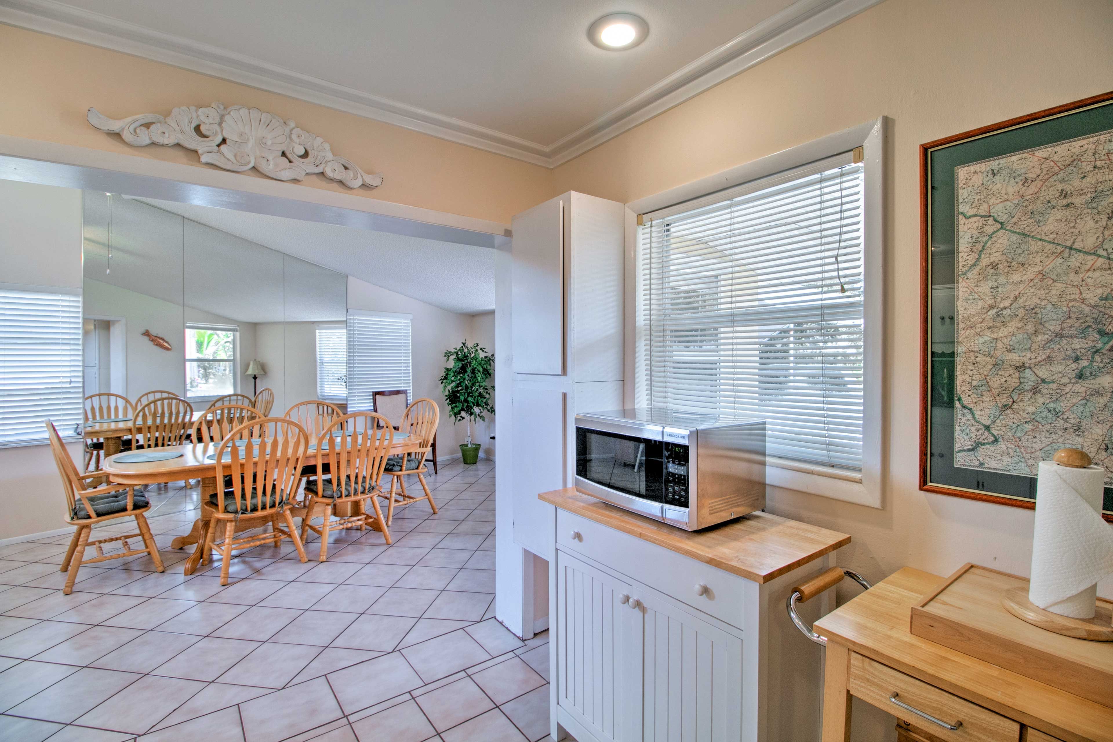 The well-equipped kitchen has all the necessary pots, pans, and appliances.