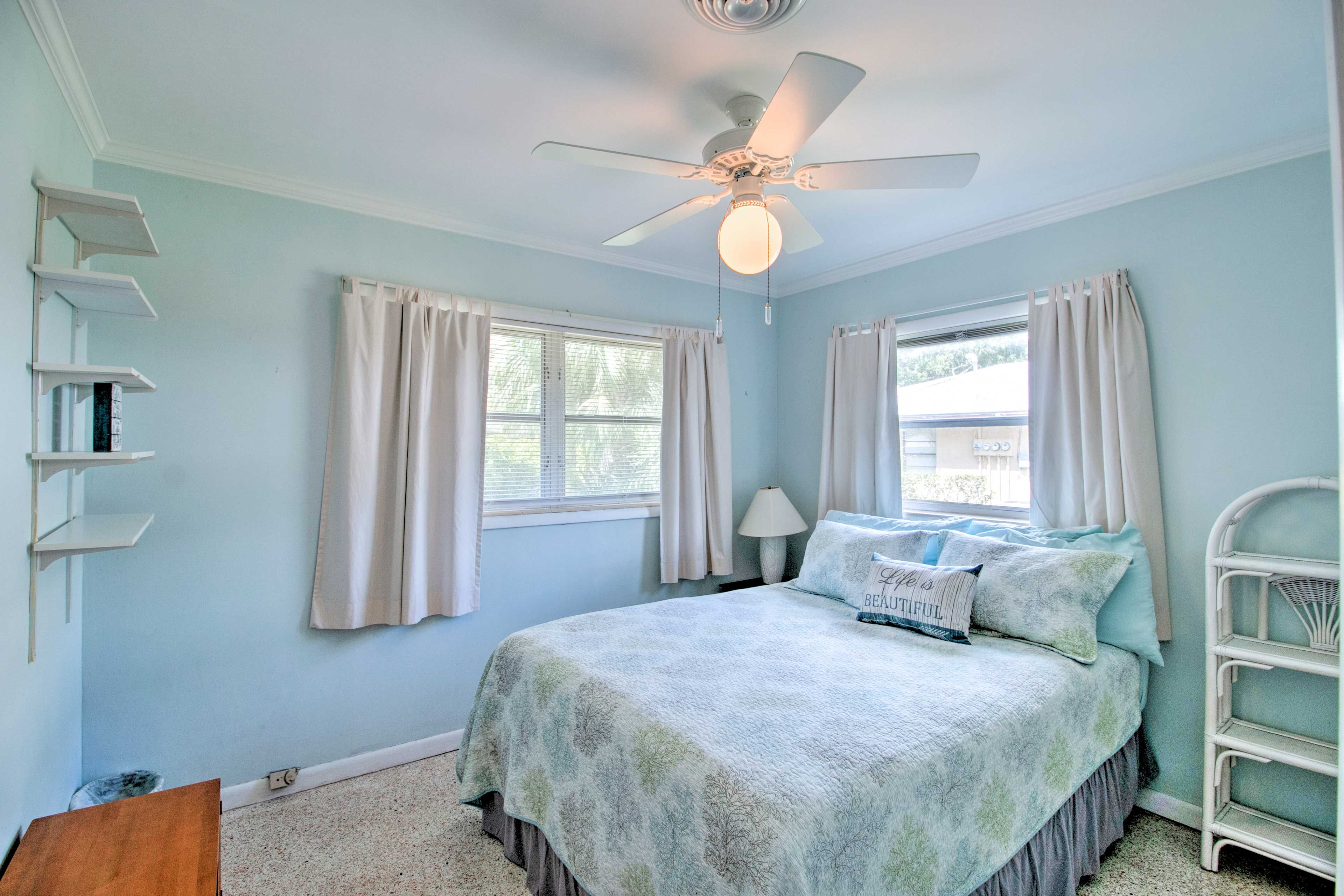 Sink into this queen bed for a peaceful night of rest.