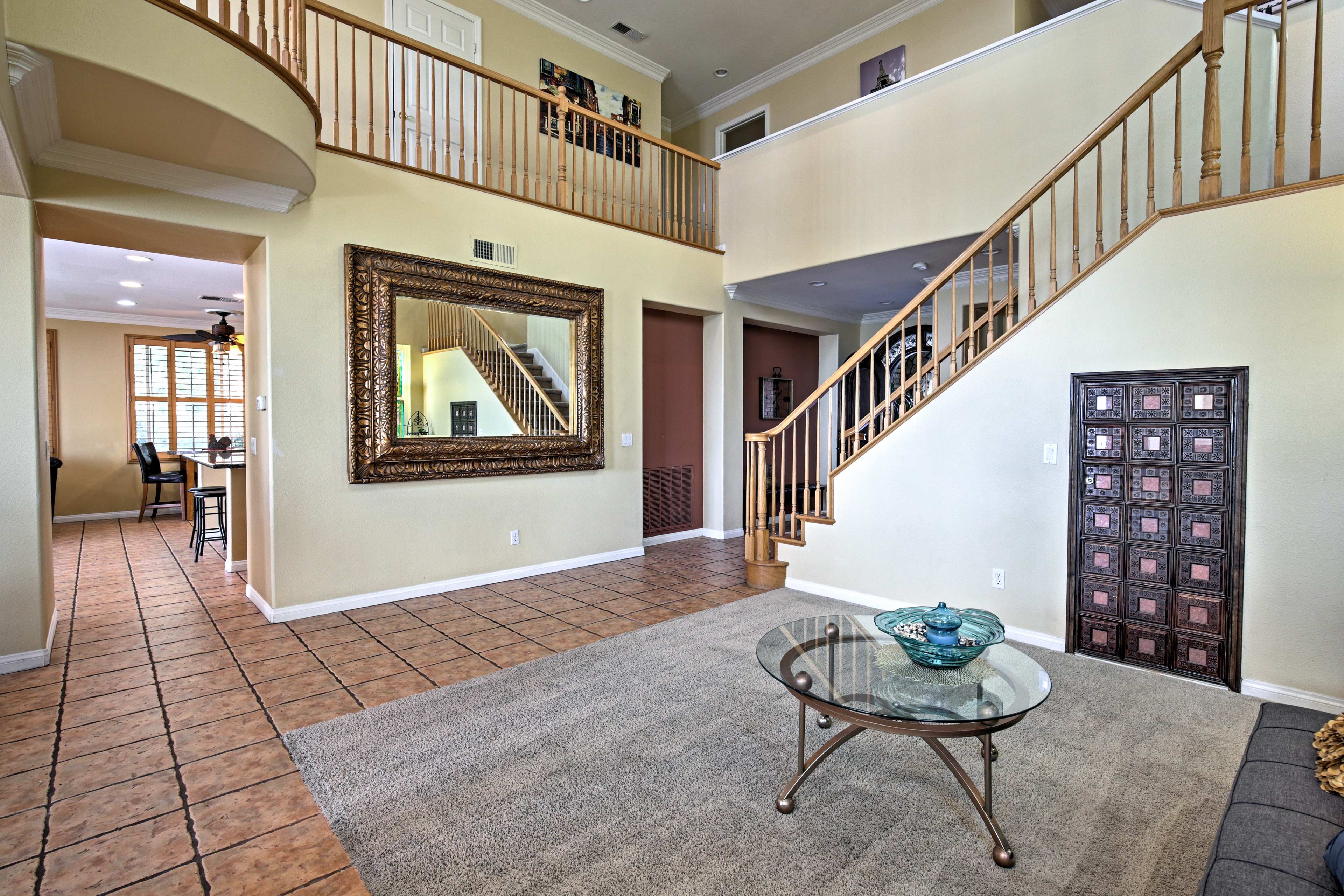 Tall ceilings greet you at the front door.
