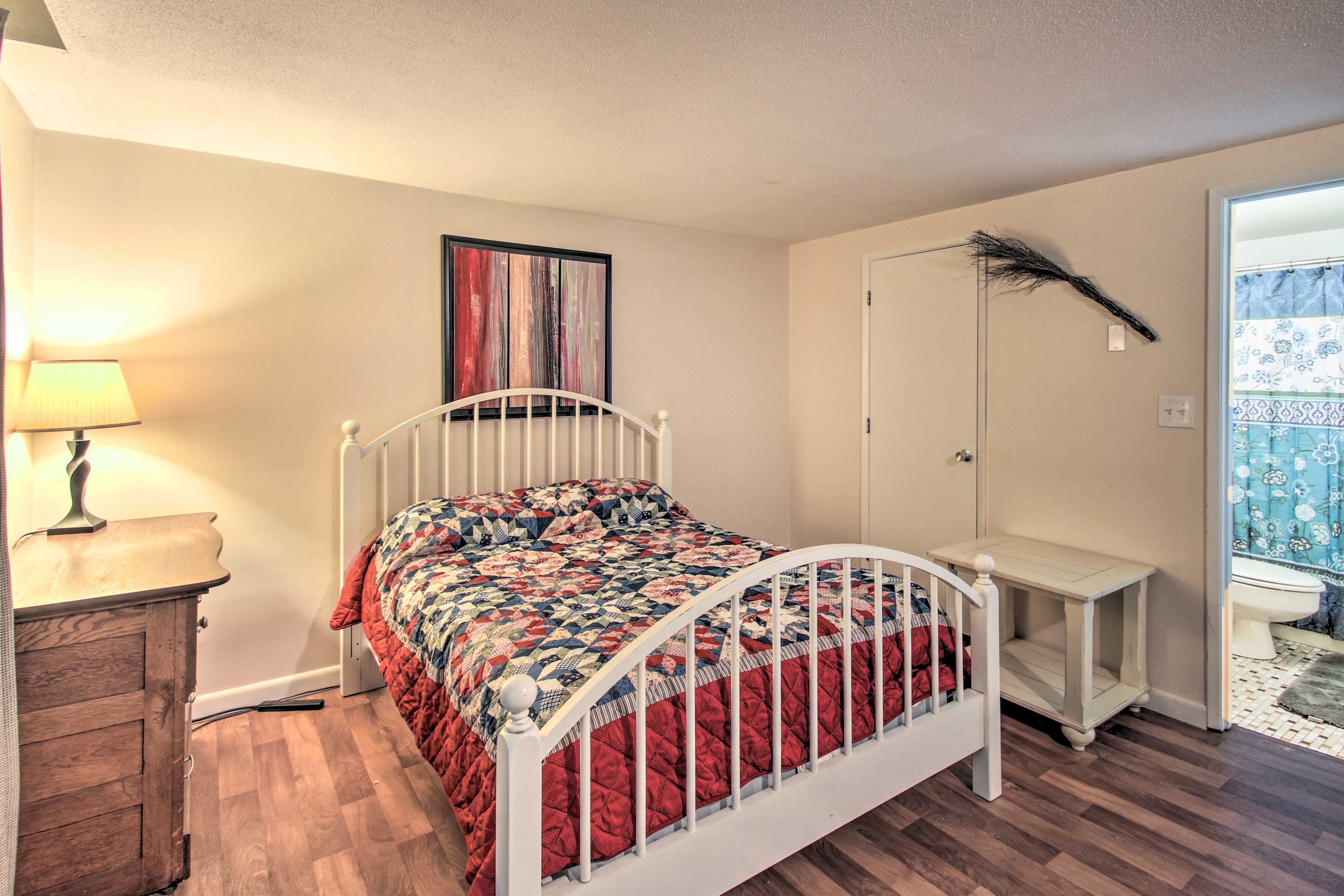 Two guests can sleep on this queen bed.