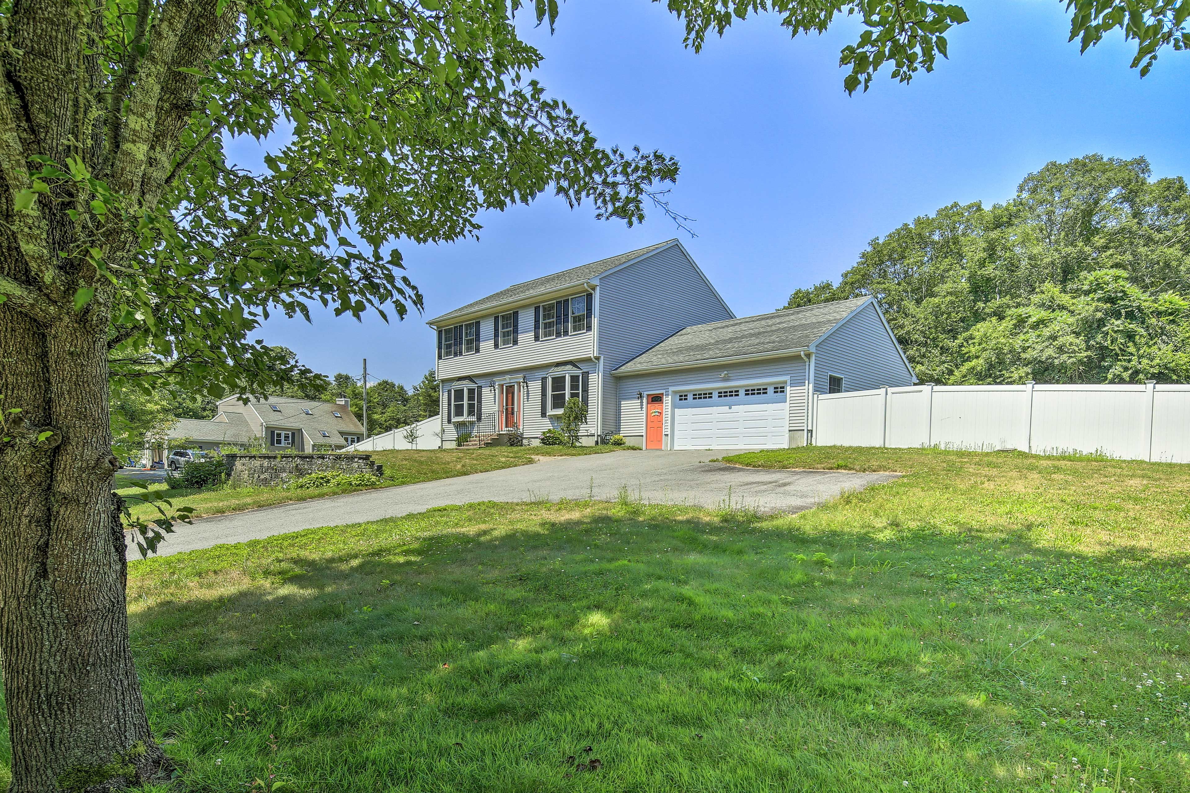 Both garage and driveway parking are available.