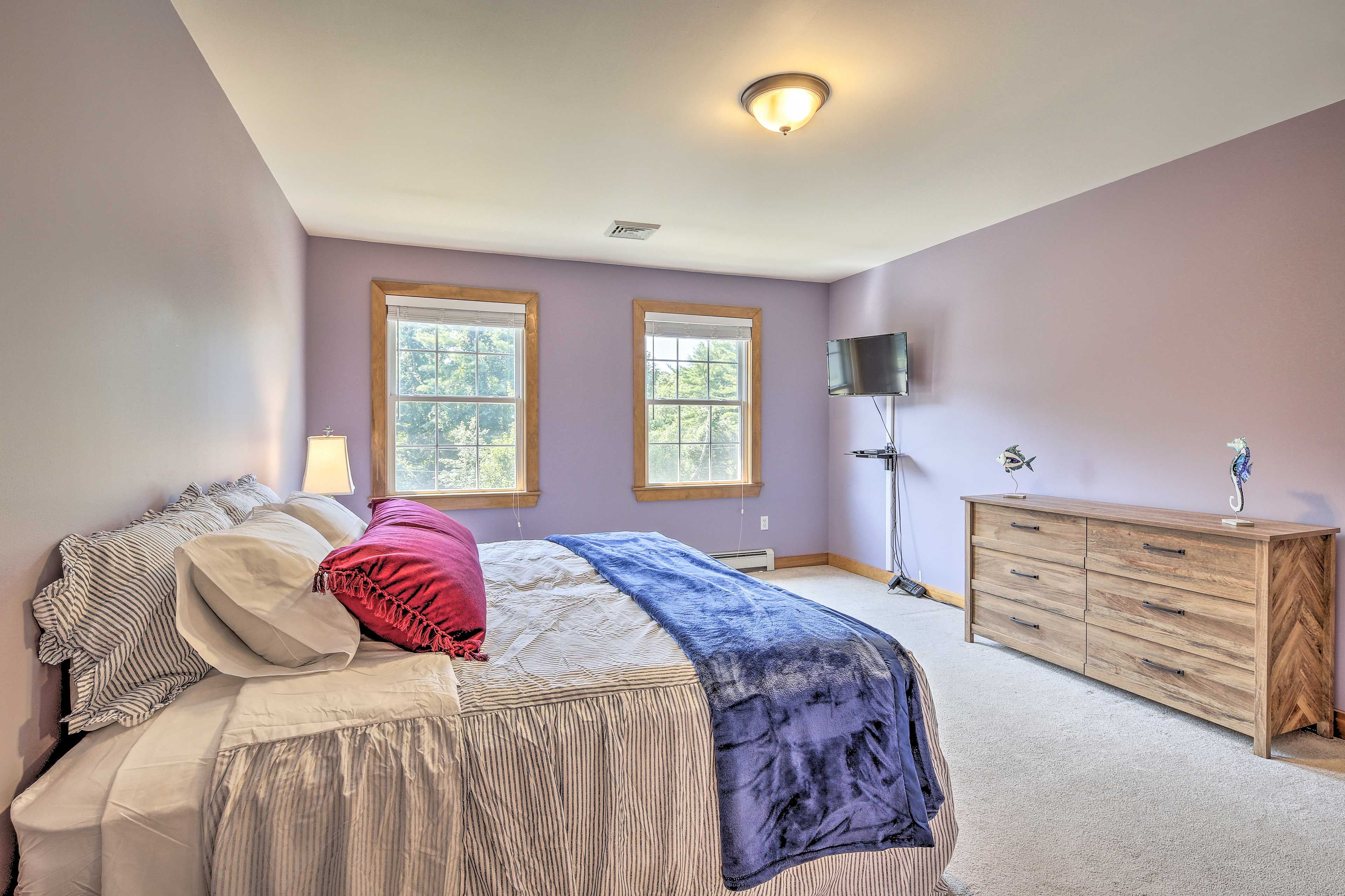 The flexible sleeping space also features a flat-screen cable TV.