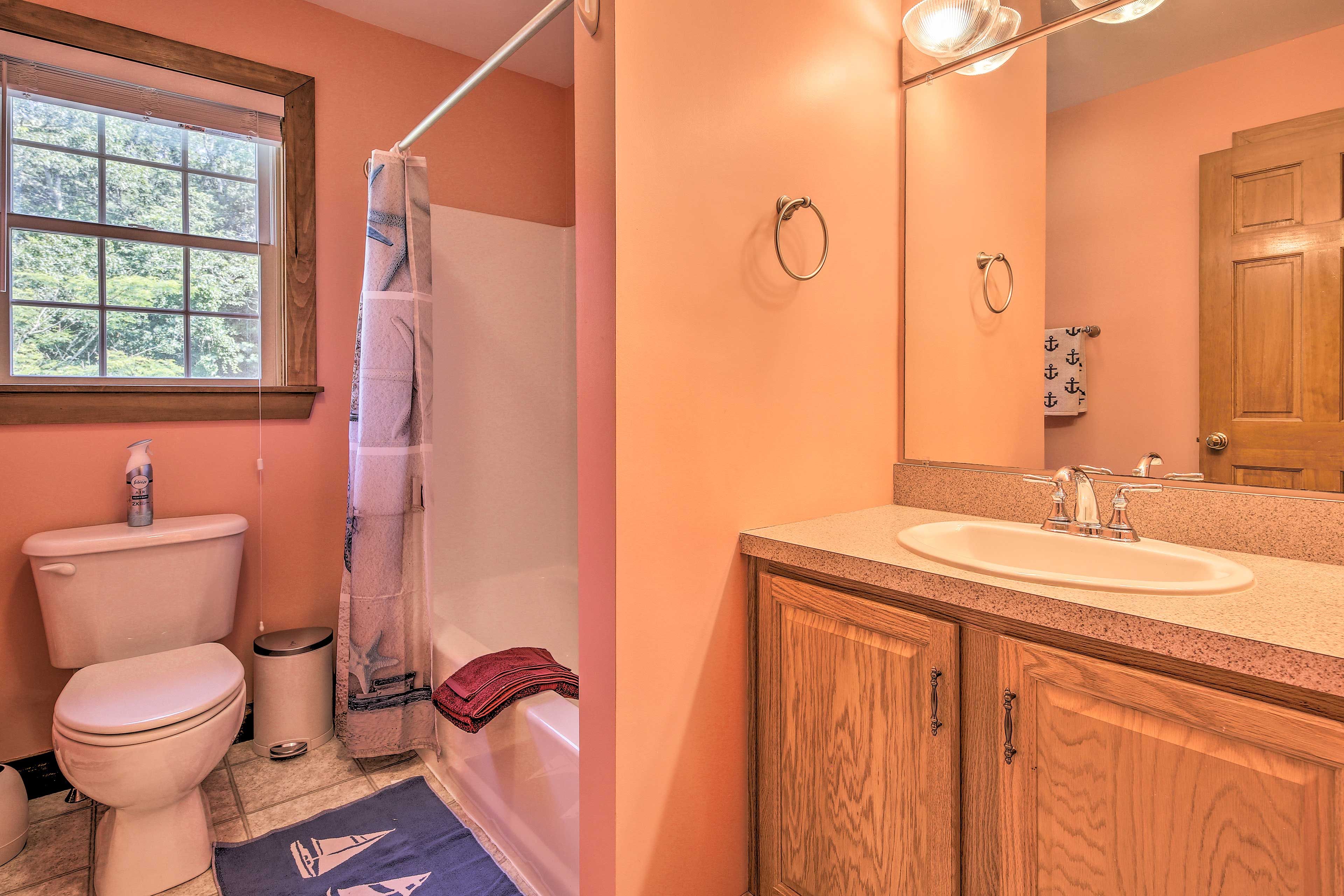 The second full bathroom is equipped with a shower/tub combo.