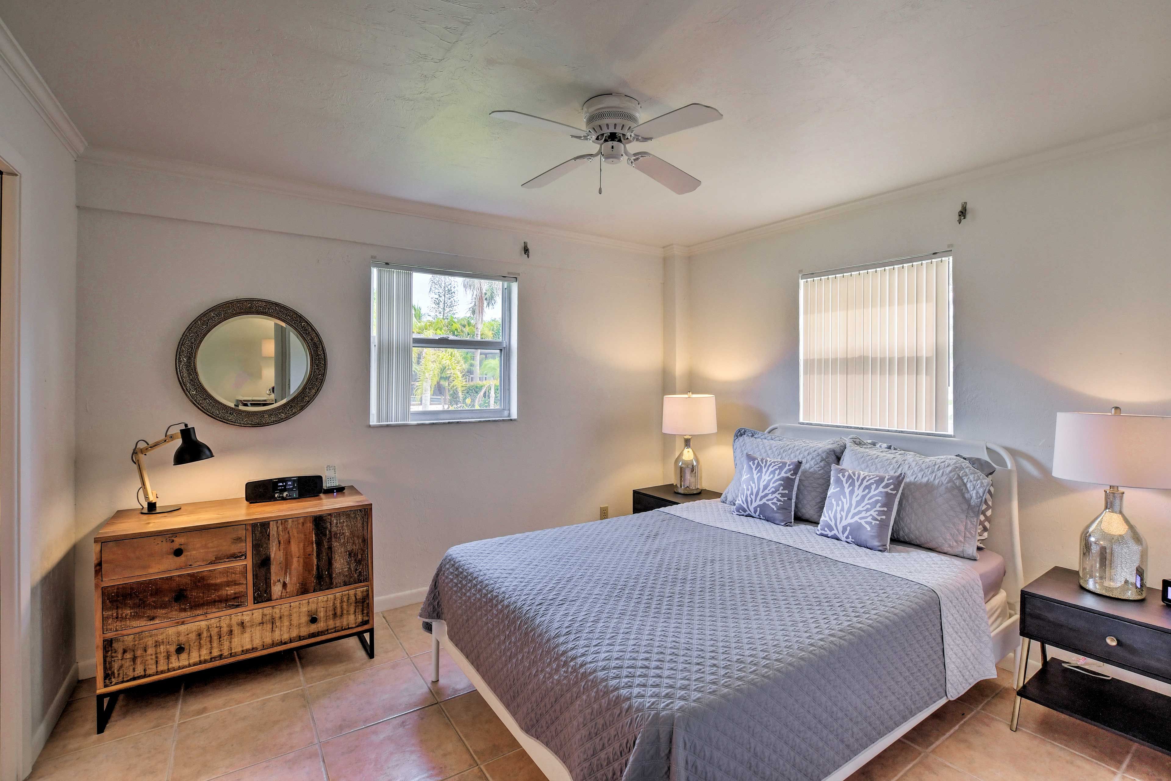Curl up on this queen bed for a peaceful night of rest.