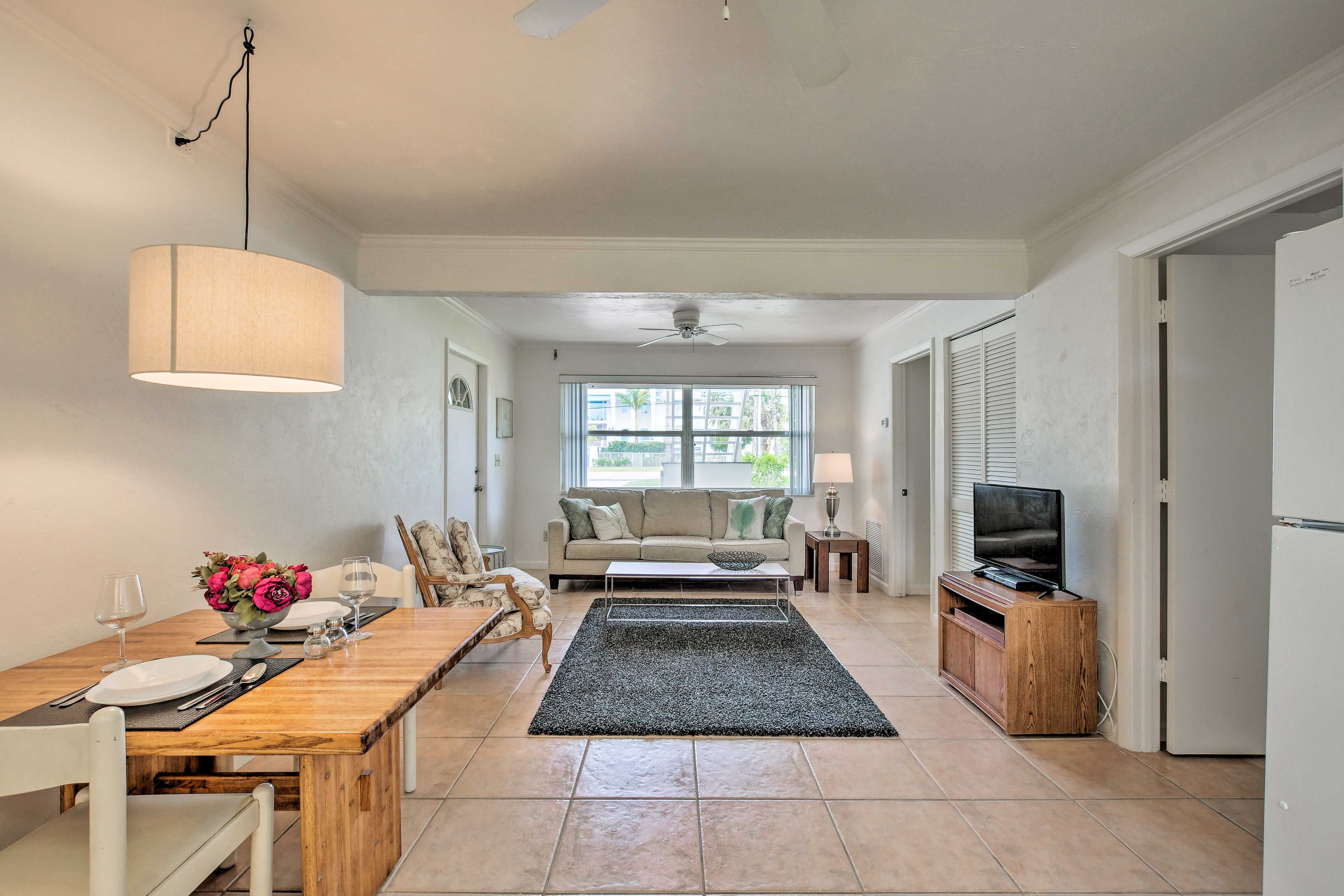 Gather around the 2-person dining table to dig in to a nice meal.
