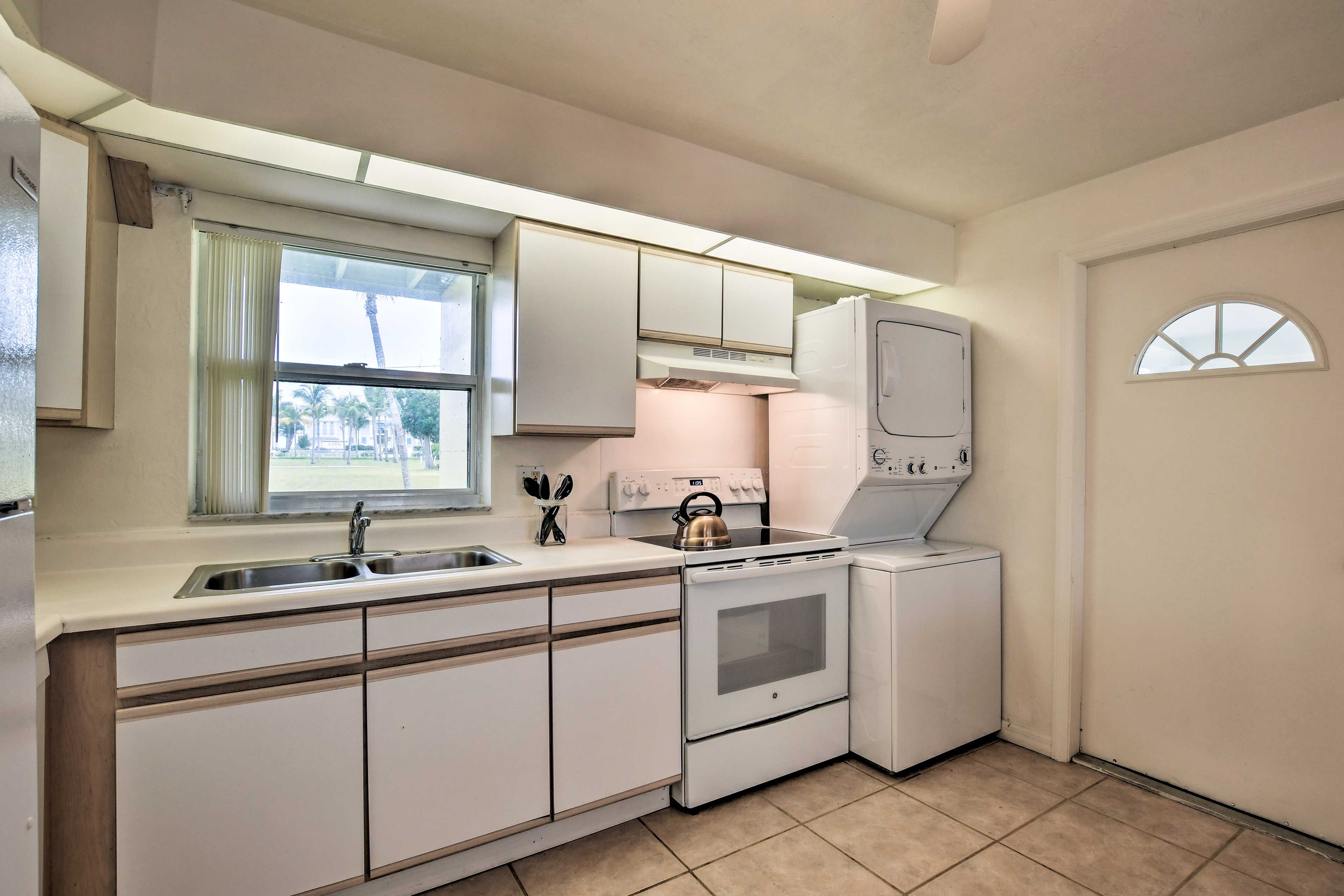 There are also laundry machines in the kitchen area.