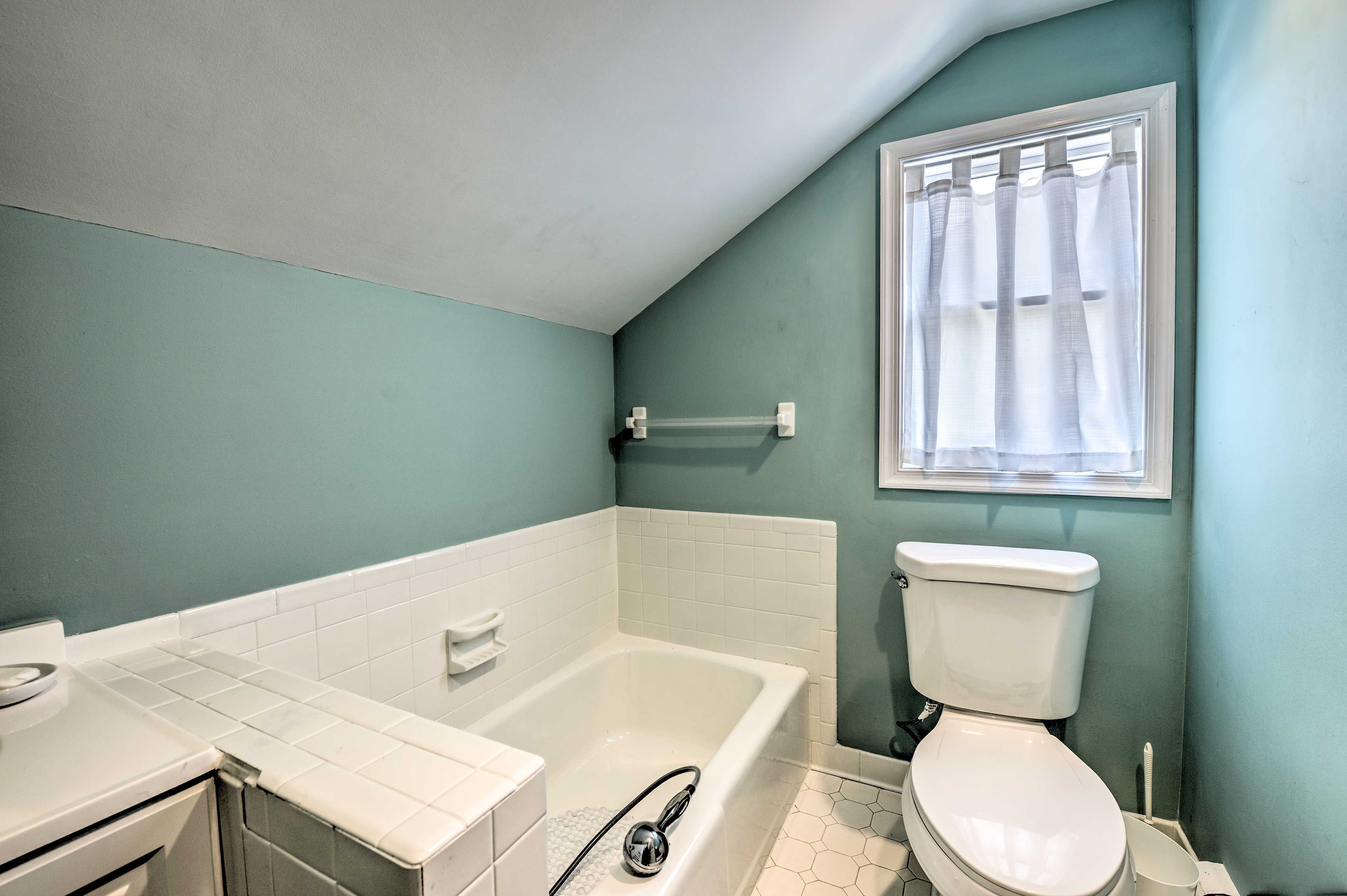 Get ready for the day with ease in the en-suite bathroom.
