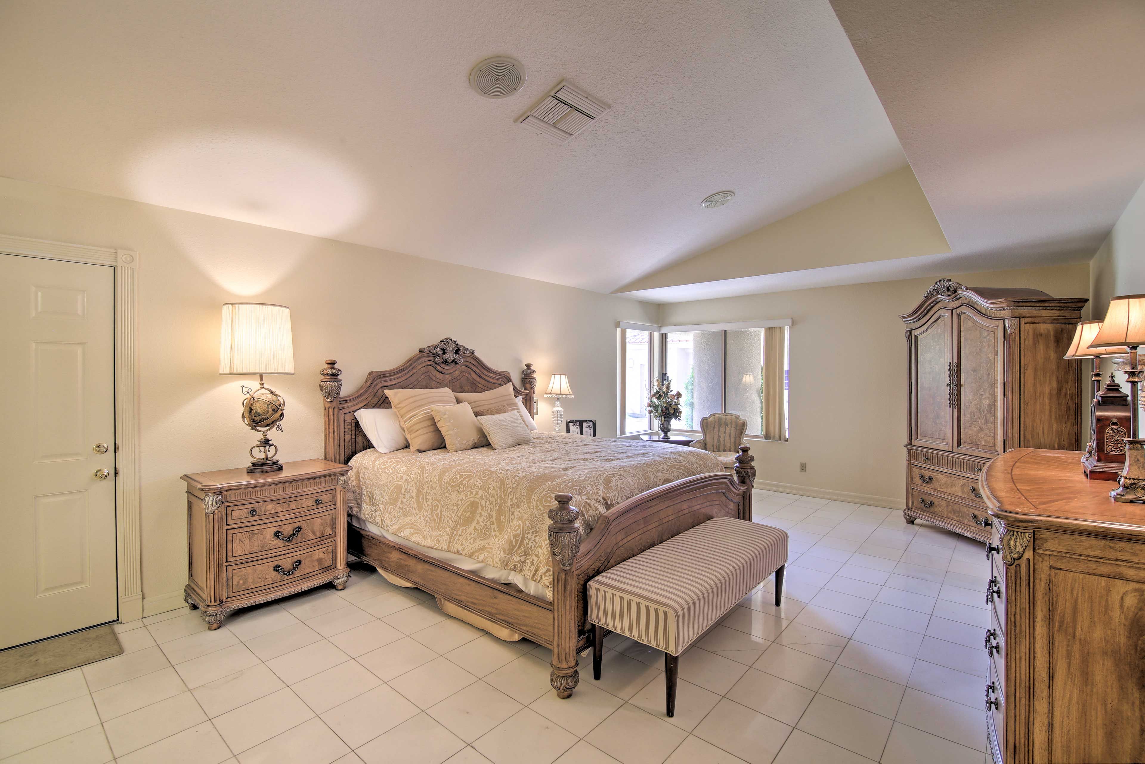 The first bedroom is a spacious retreat.