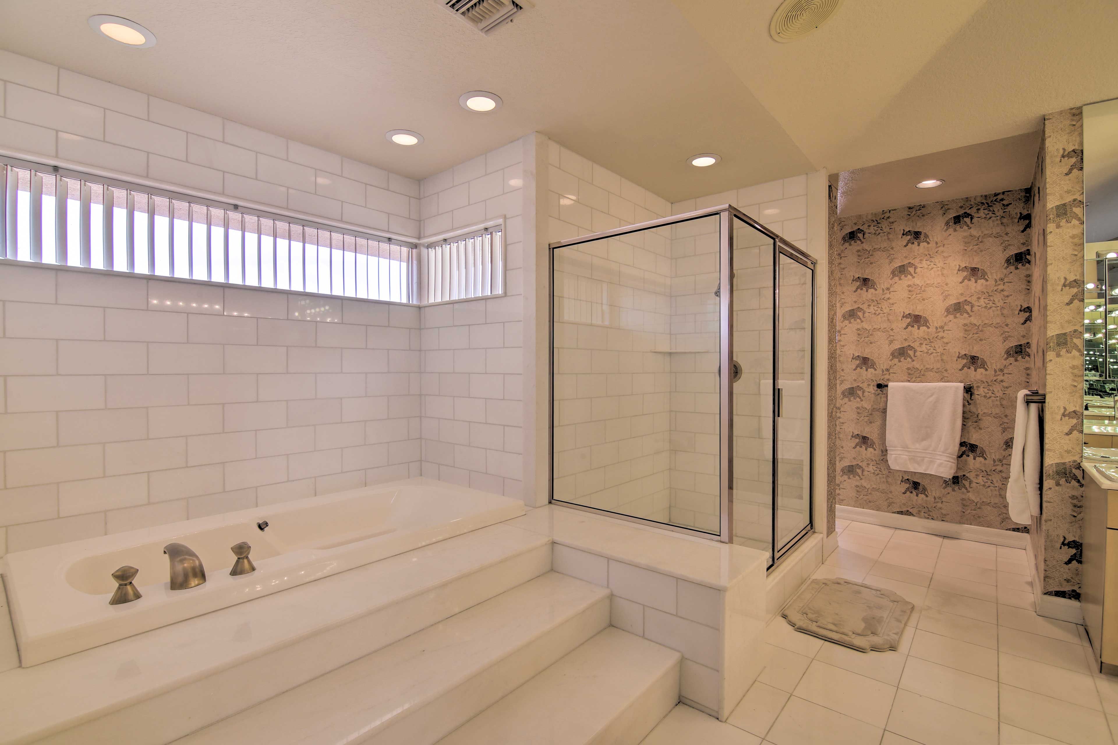 Rise off in the walk-in shower or enjoy a relaxing bath.