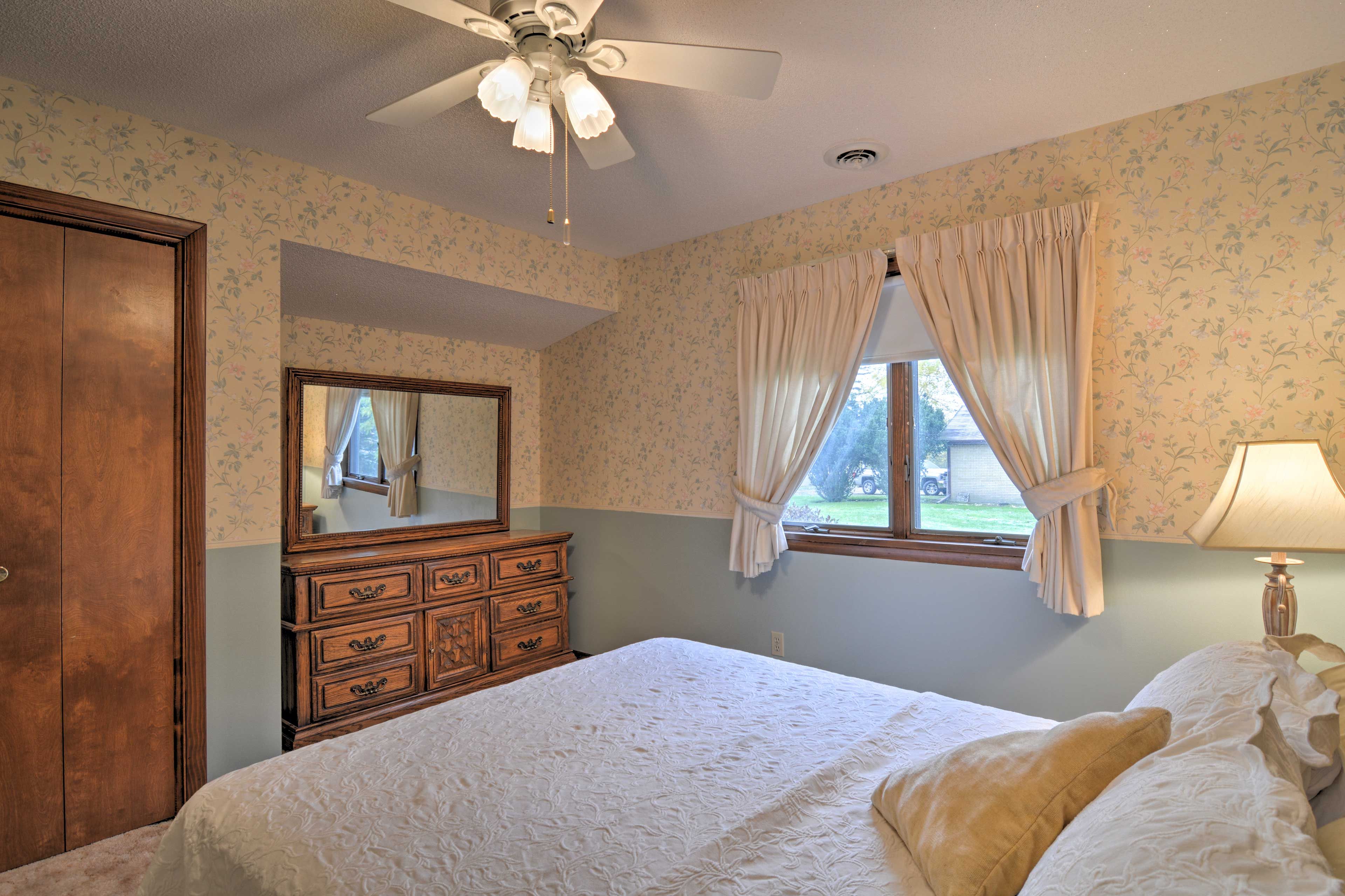 The second bedroom is home to a queen bed.