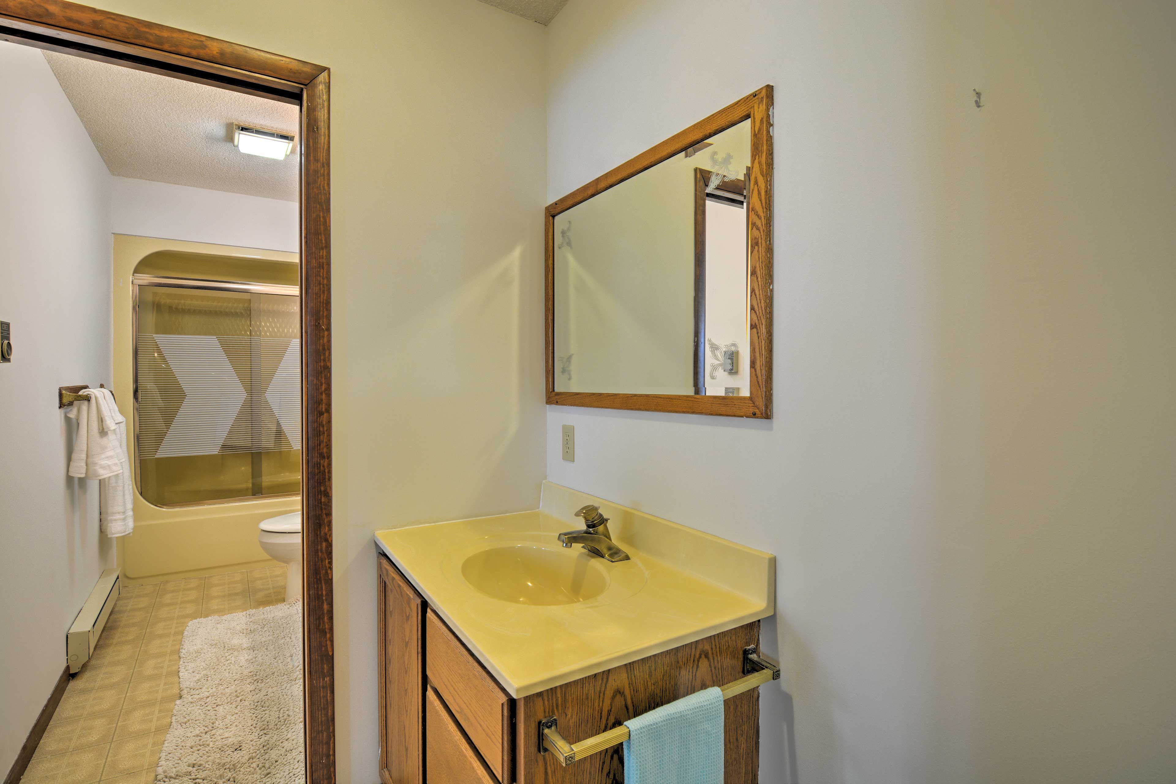 There's an additional sink outside the bathroom.