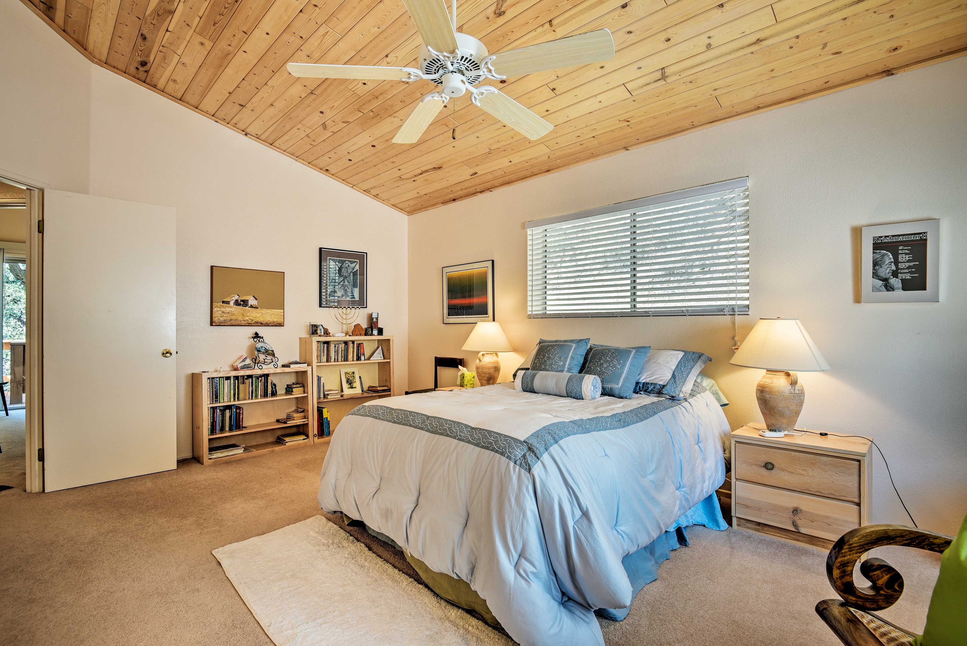 Drift to sleep in this queen bed.