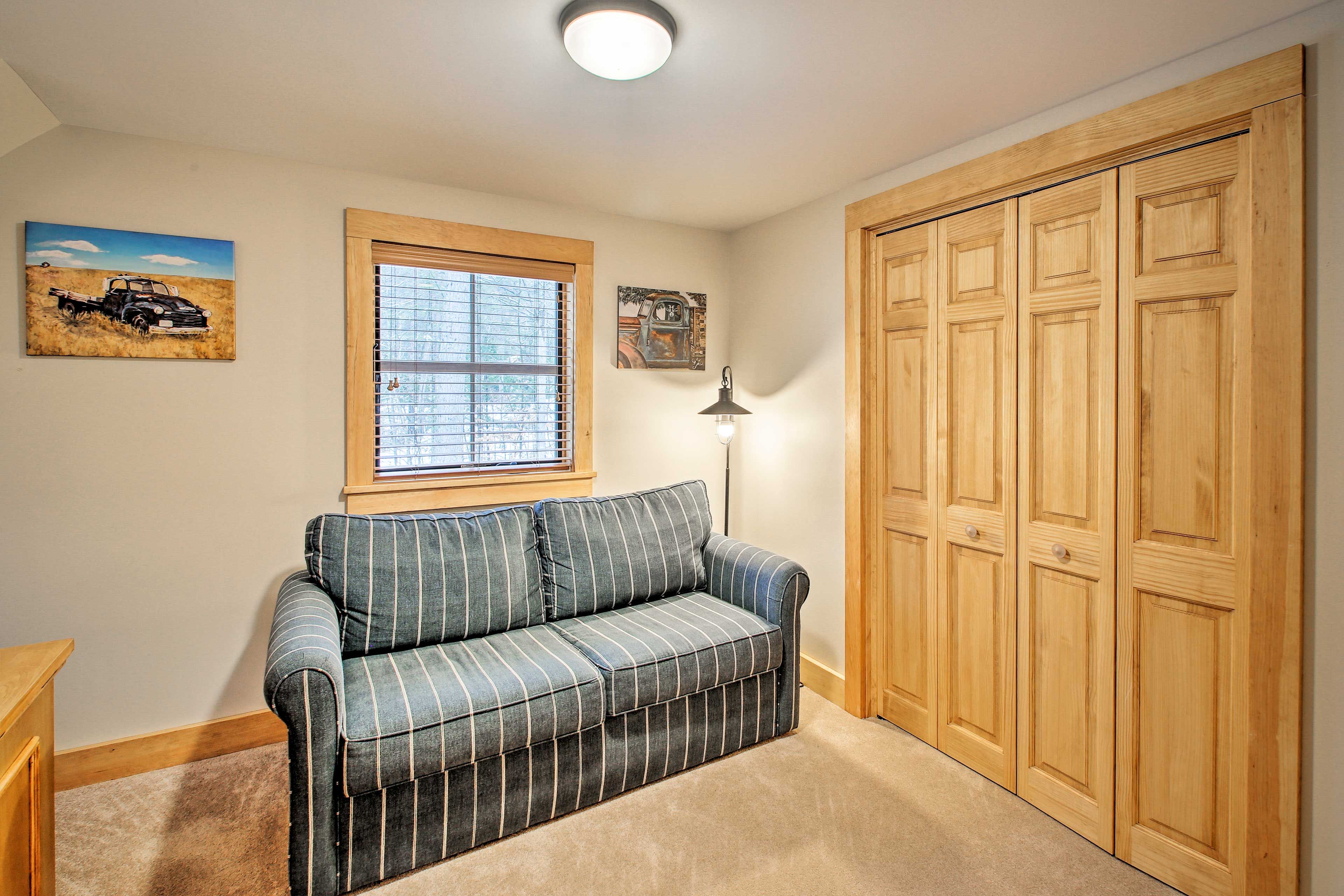 Two guests can claim the sleeper sofa.