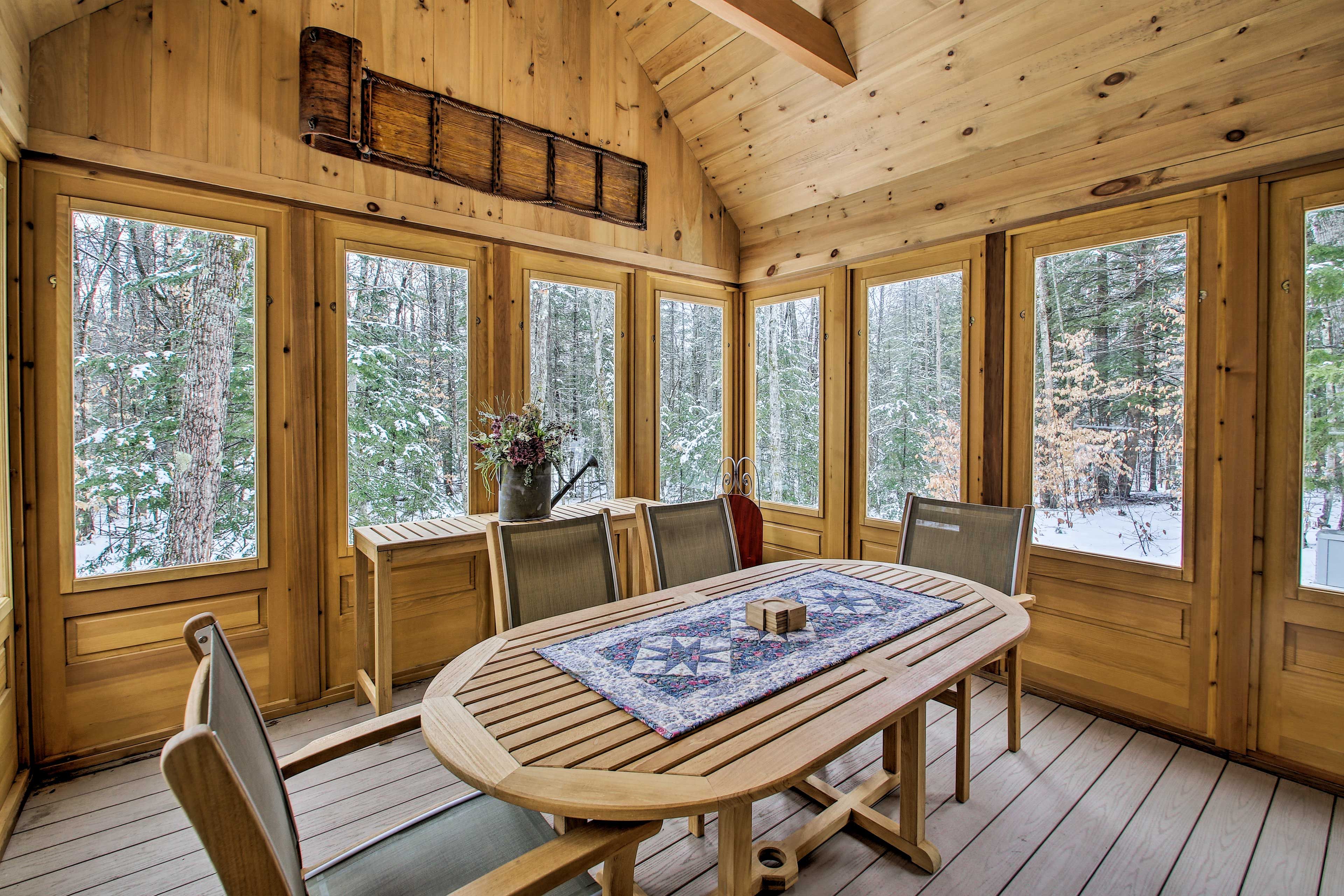 In the summer, take advantage of the screened-in porch.