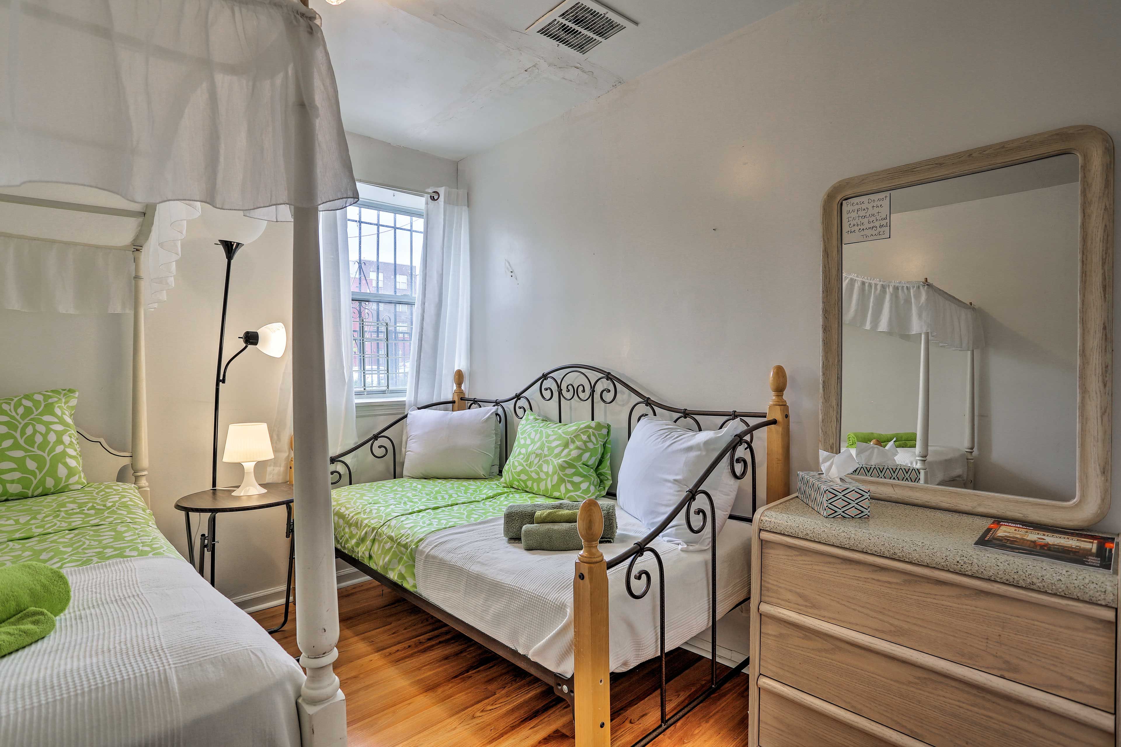 The third bedroom features 2 twin beds.