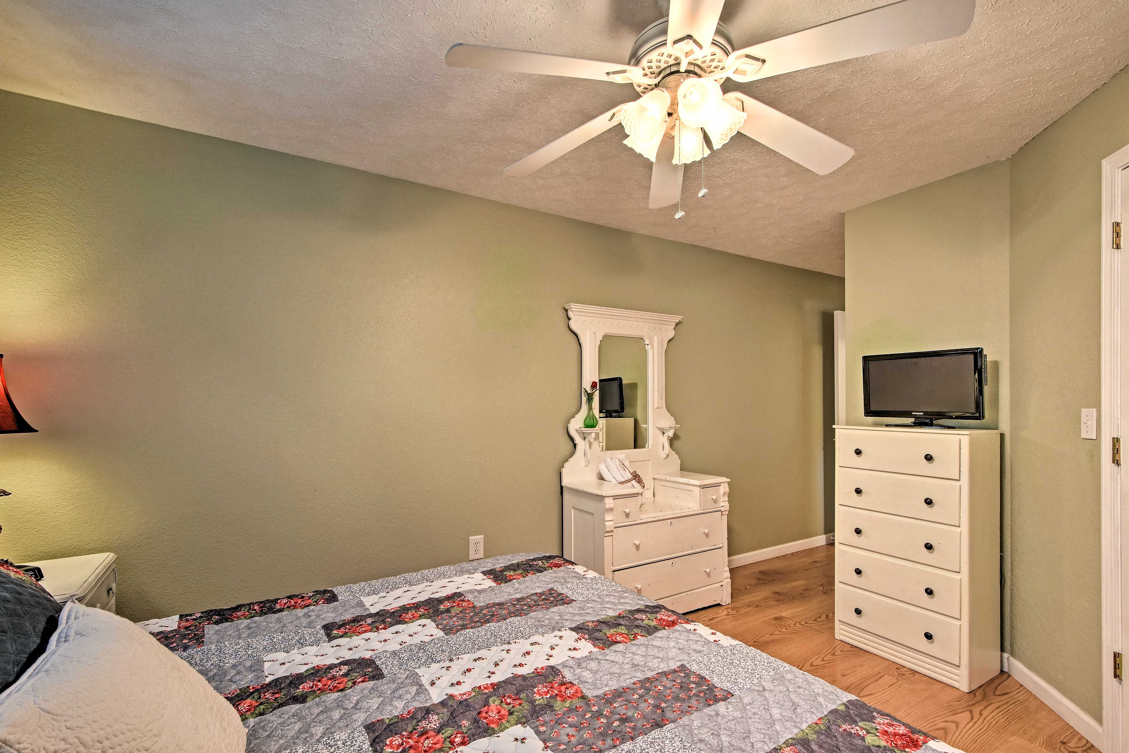 The ceiling fan will keep a breeze flowing while you sleep.