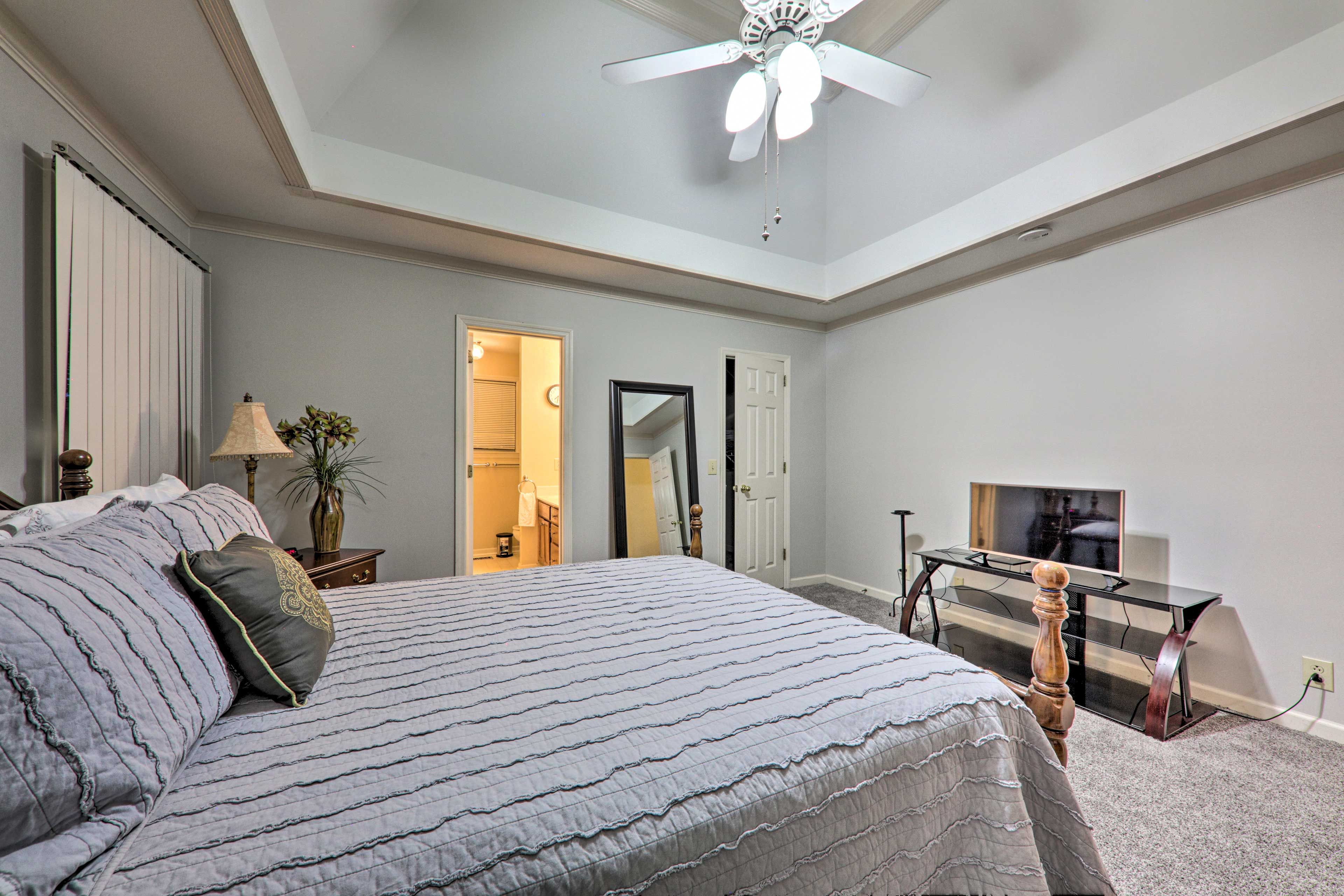 This room hosts a queen bed and flat-screen TV.