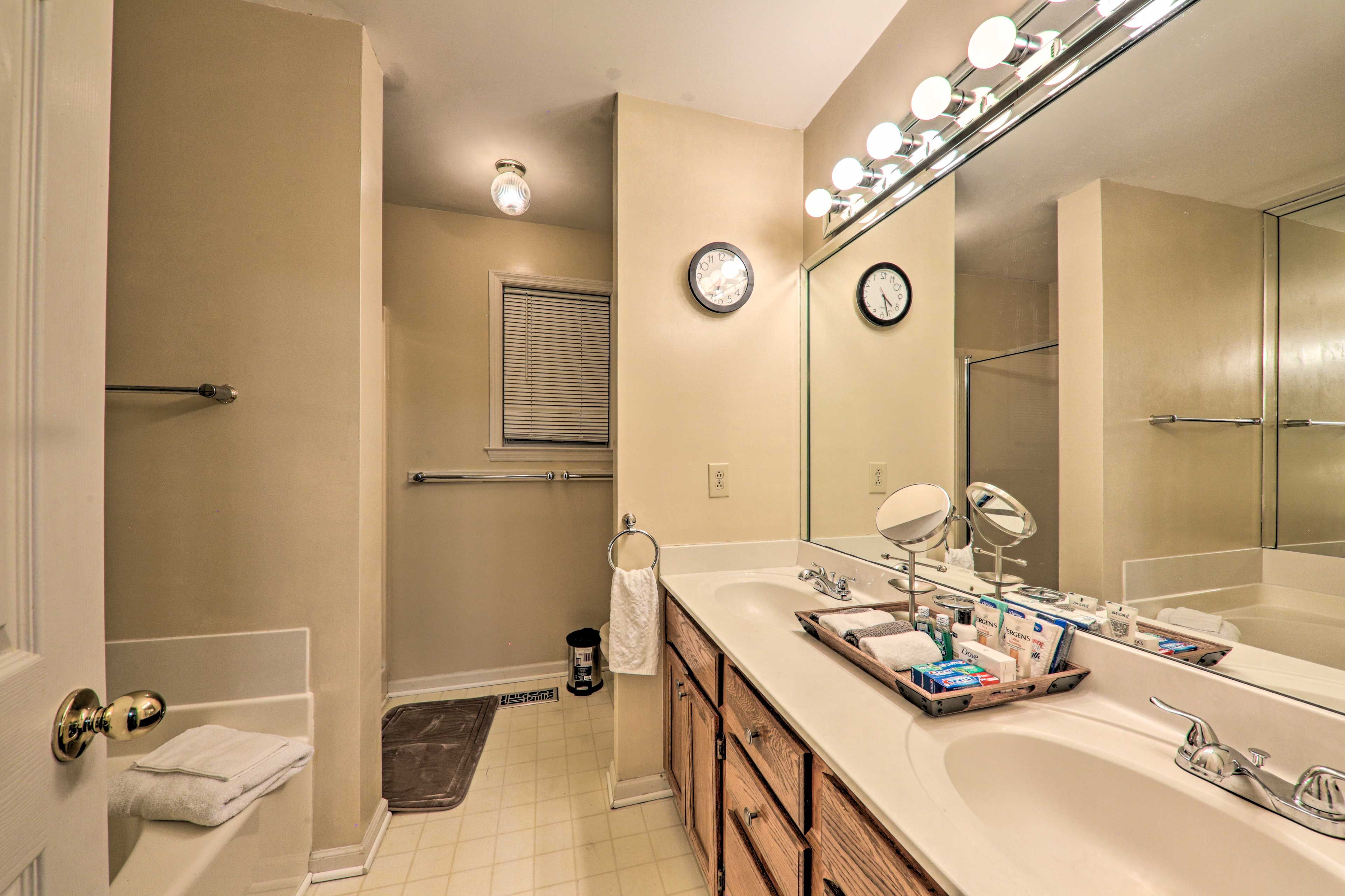 Get ready for the day in the en-suite bathroom.