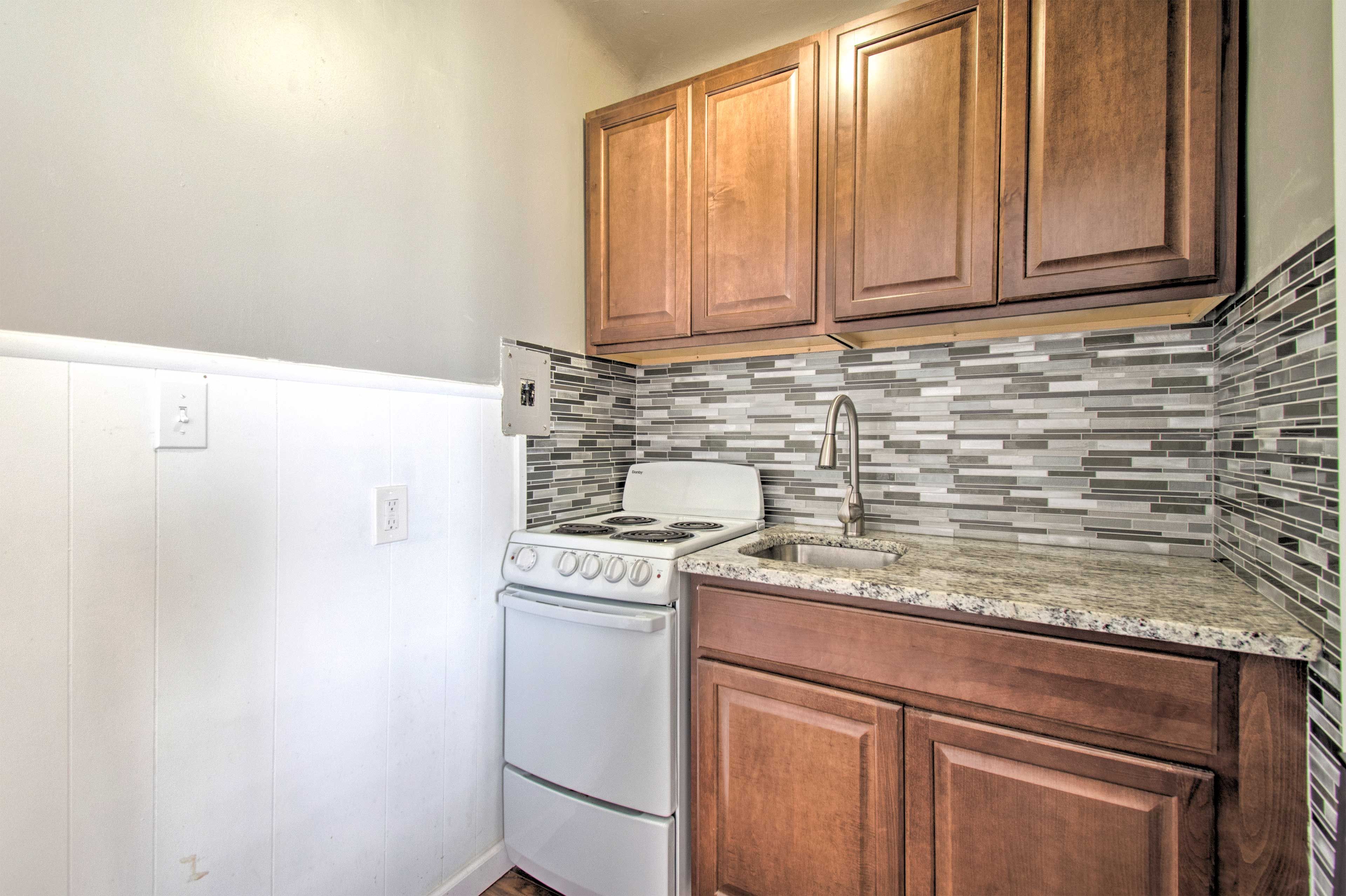 The unit features a kitchenette for you to use.