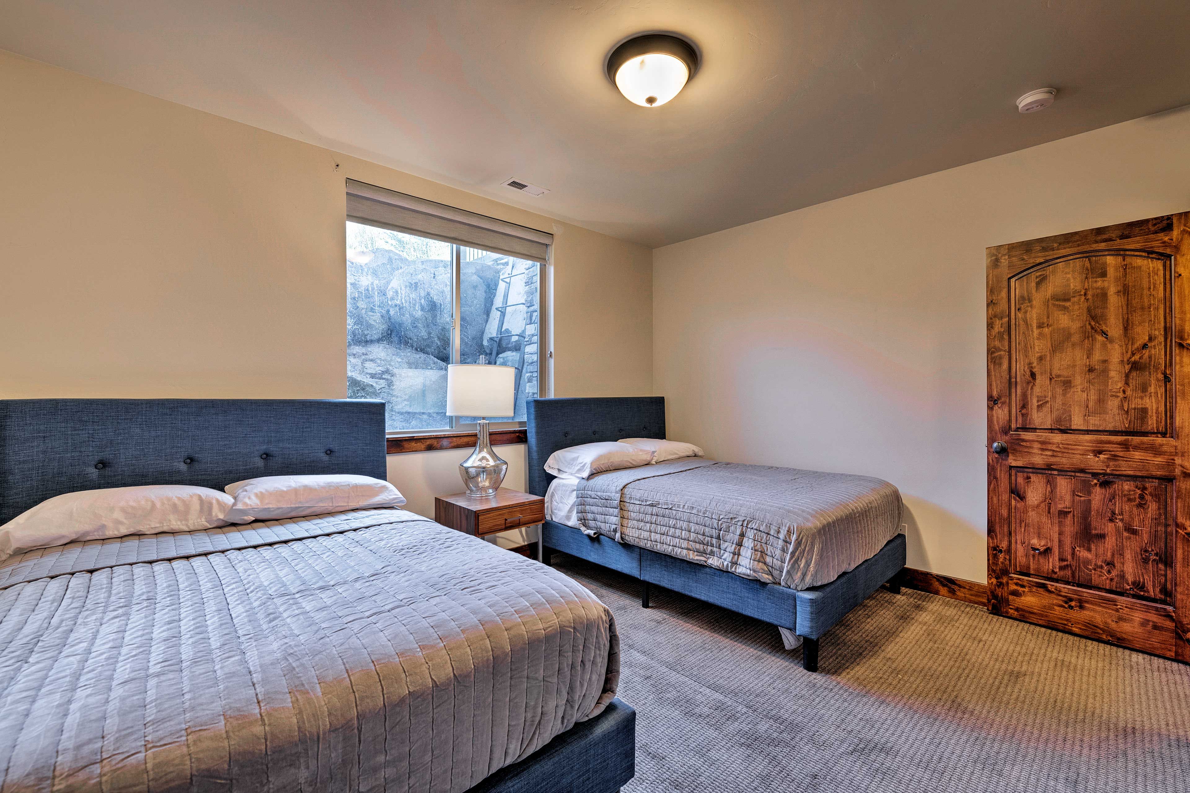 The third and final bedroom features 2 full-sized beds.