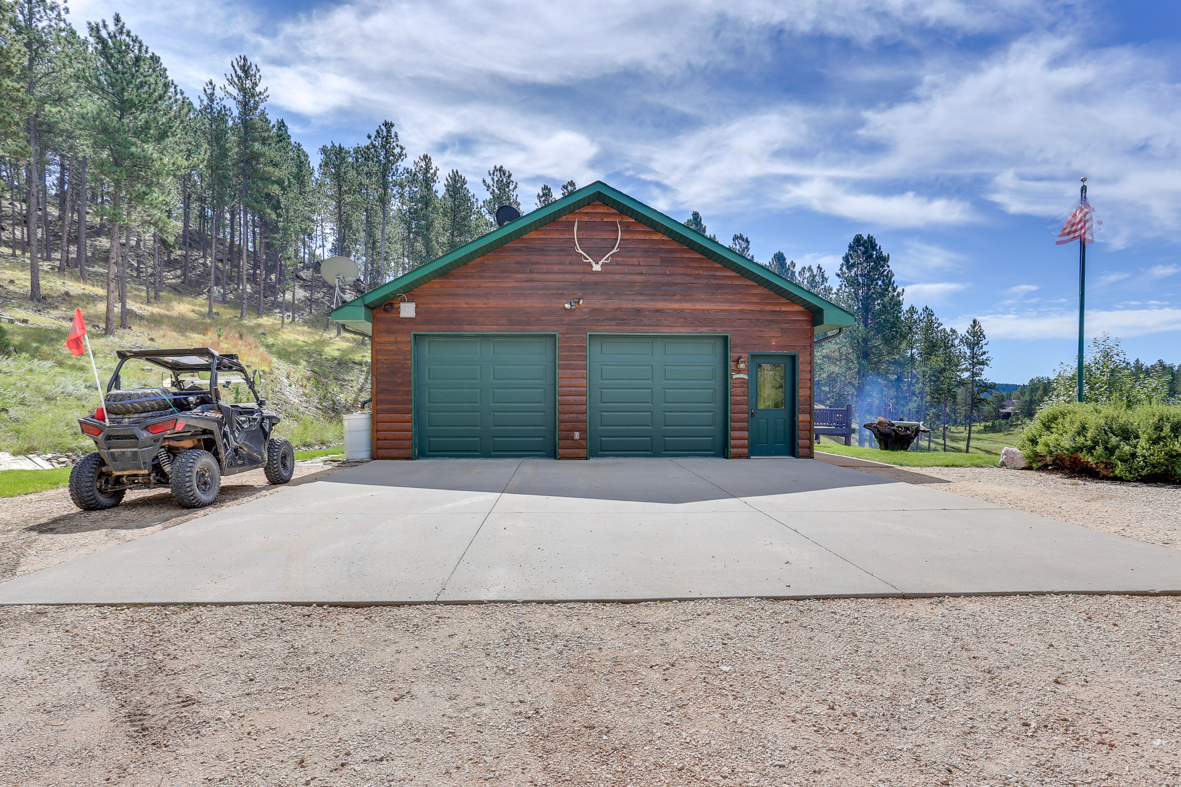 Parking | Garage (2 Vehicles) | Driveway (4 Vehicles) | 2 RV Sites w/ Hookups