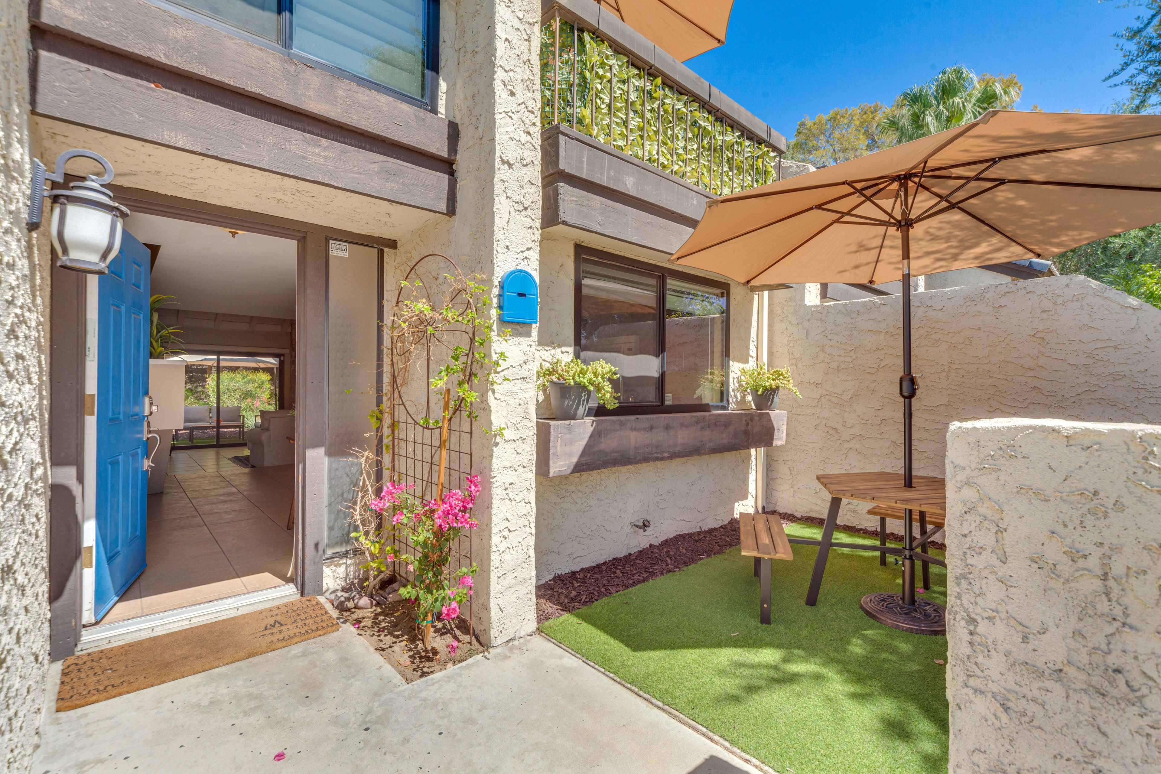 Townhome Exterior | Entry | Patio w/ Dining Set