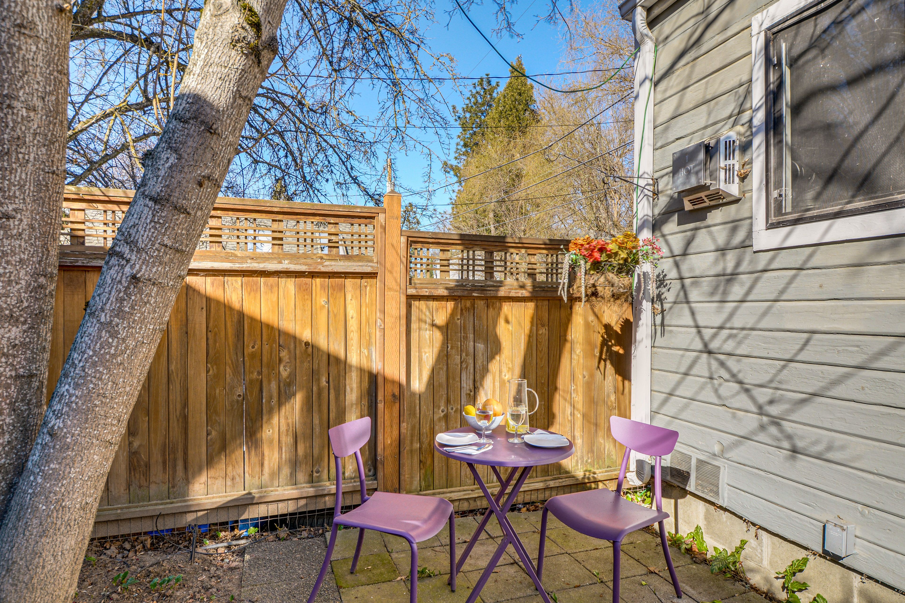 Fenced Yard | Charcoal Grill | Dining Area