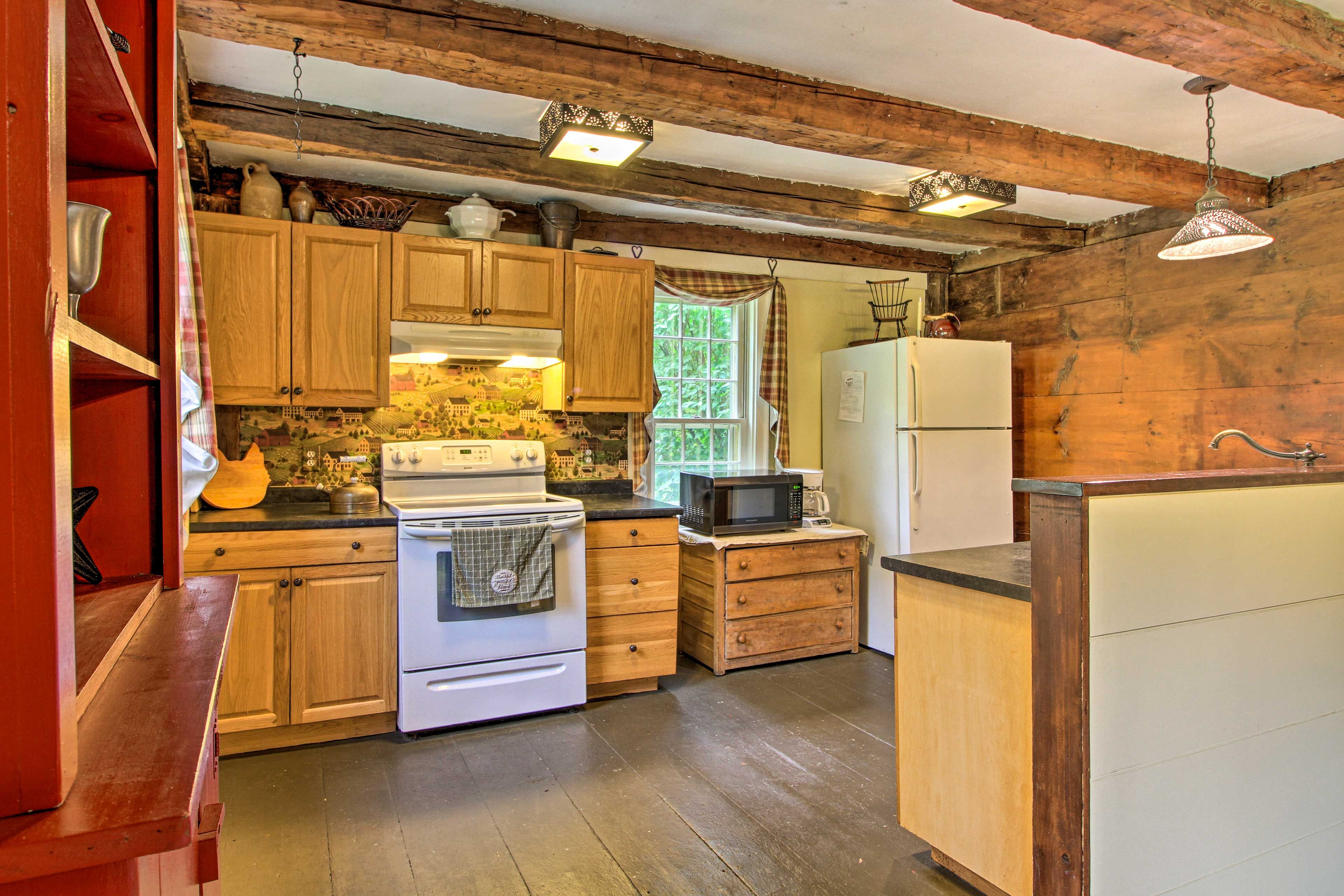 Prepare your favorite recipes in the fully equipped kitchen.