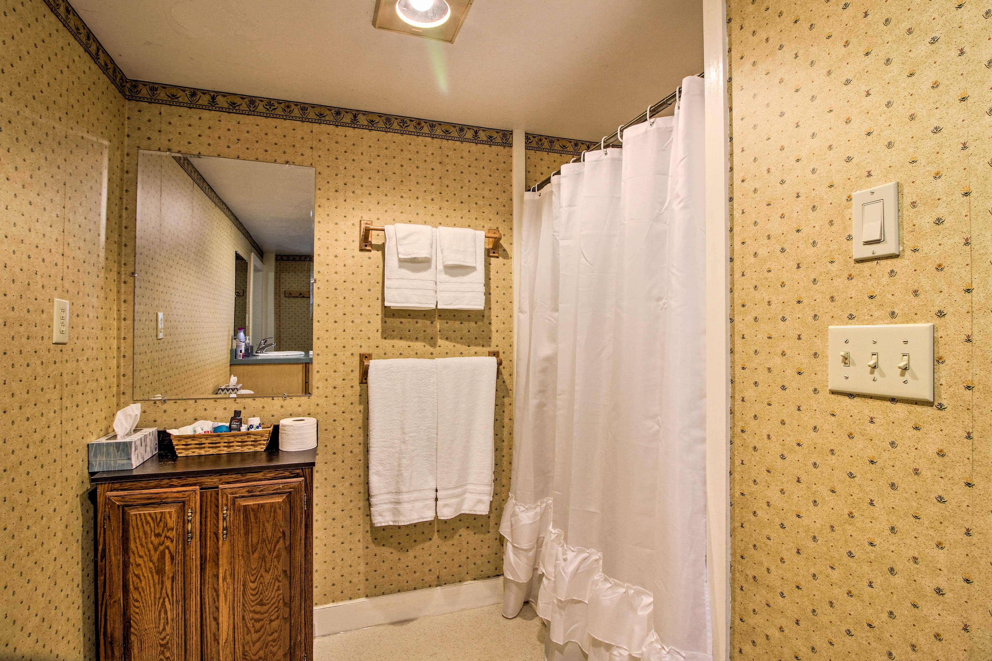 Rinse off in the shower/tub combo after your outdoor adventures.