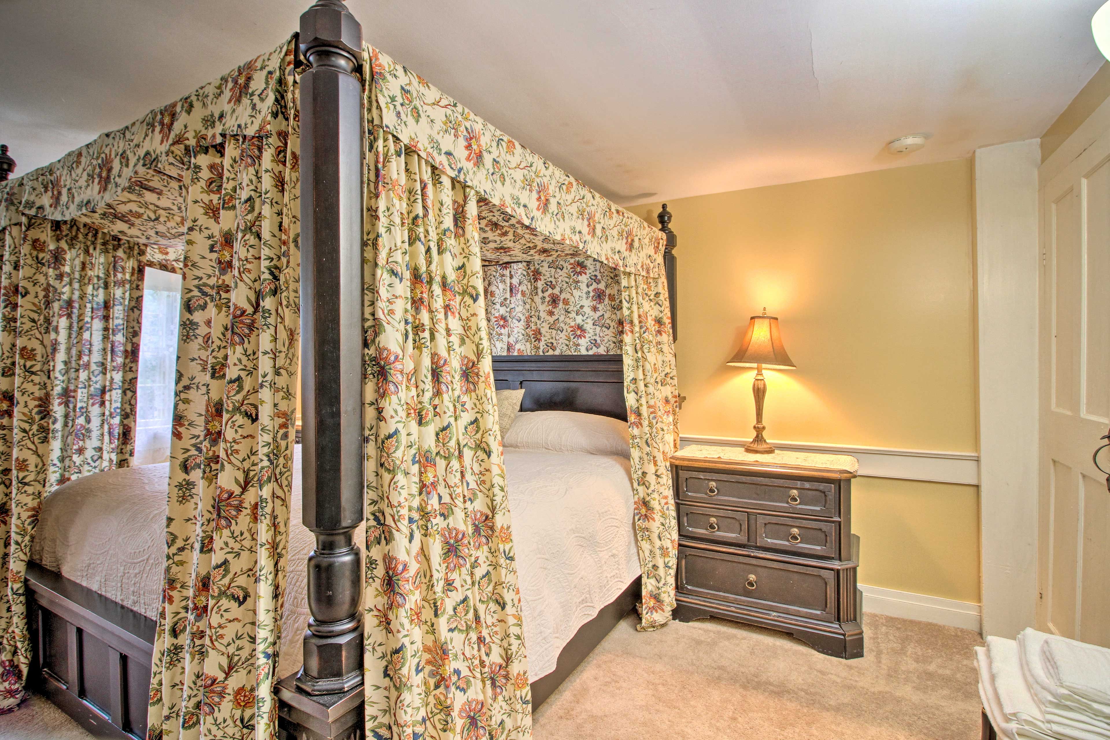 Bedroom 1 features a plush king bed.