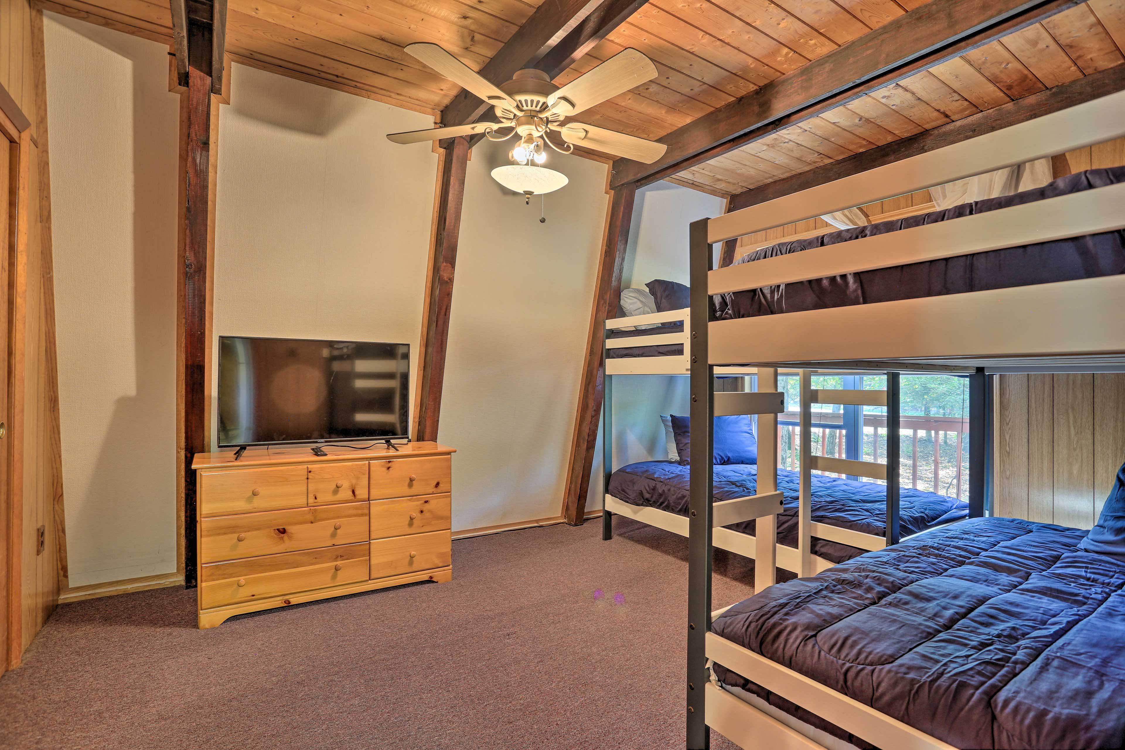 Snuggle up for a sleepover in this room, offering 2 twin-sized bunk beds.