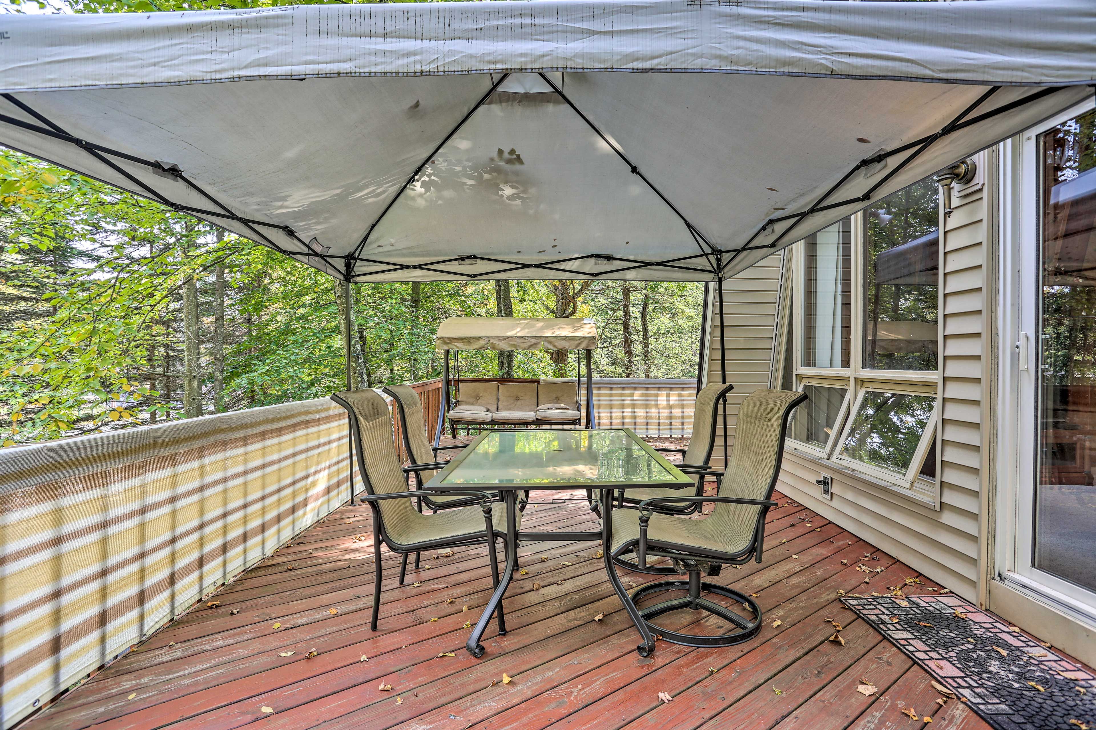 Enjoy the peaceful forest setting with a glass of wine in hand.
