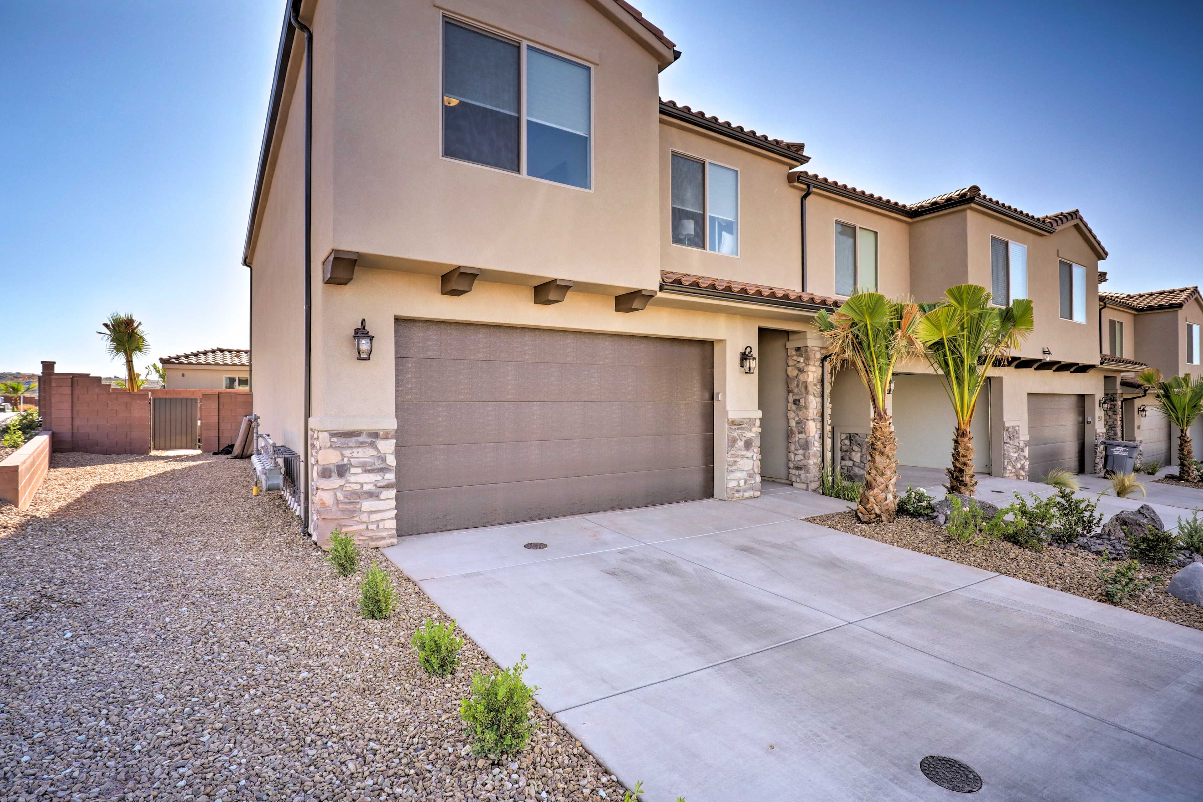 The property offers 2 garage parking spots and 2 driveway parking spots.